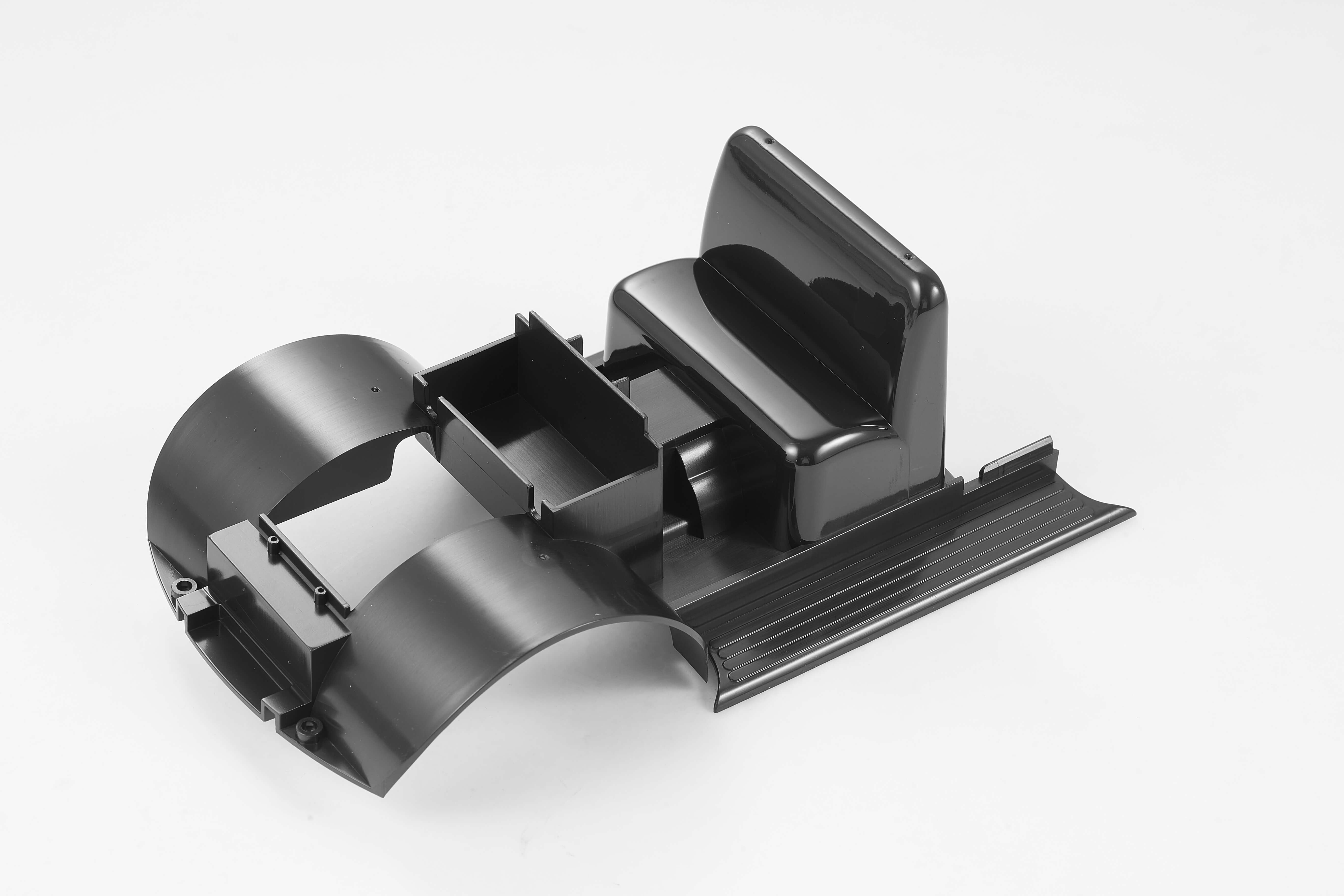 1:18 Magnum chassis part for remote control vehicle, black plastic construction.