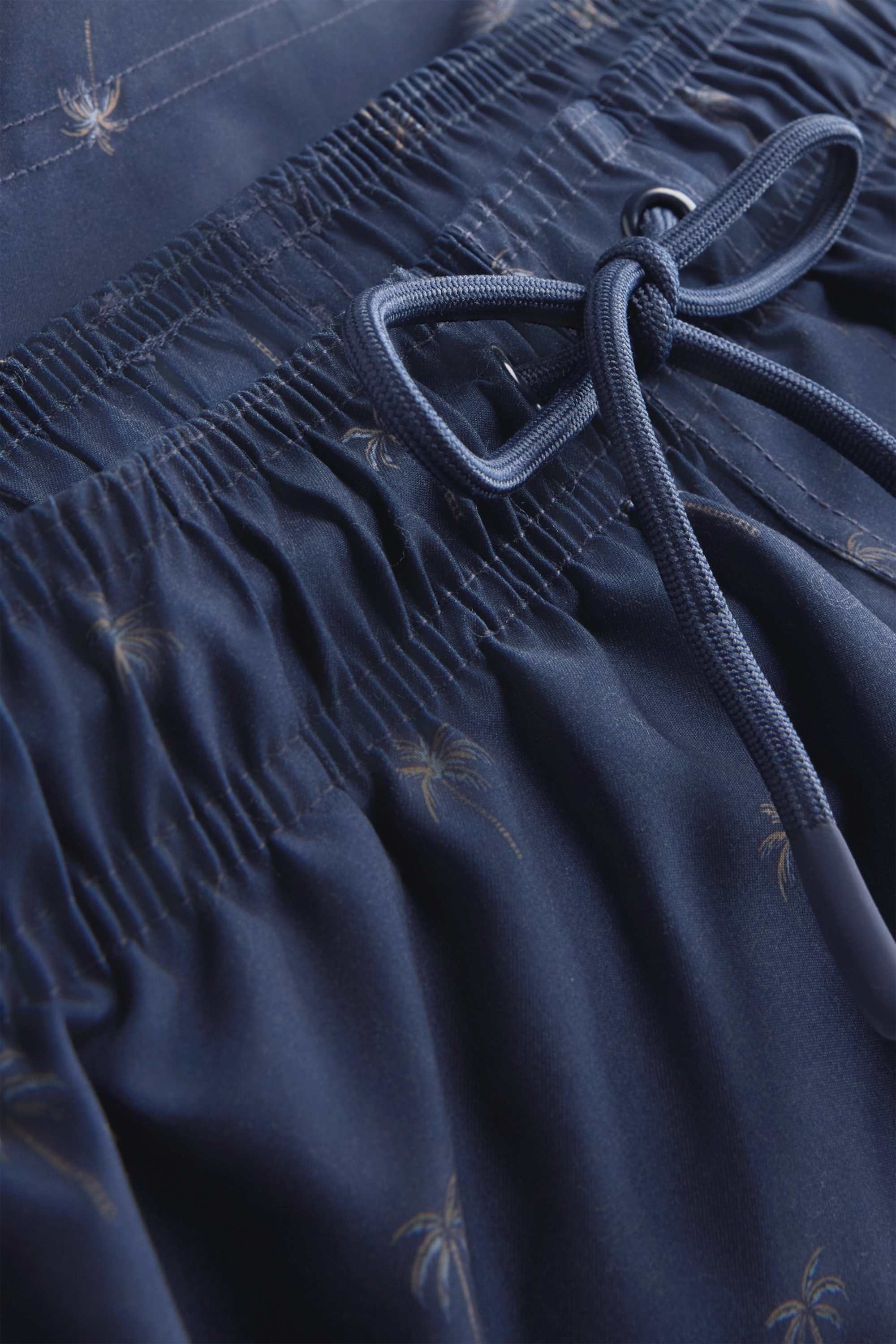 Swim shorts - patterned dark blue