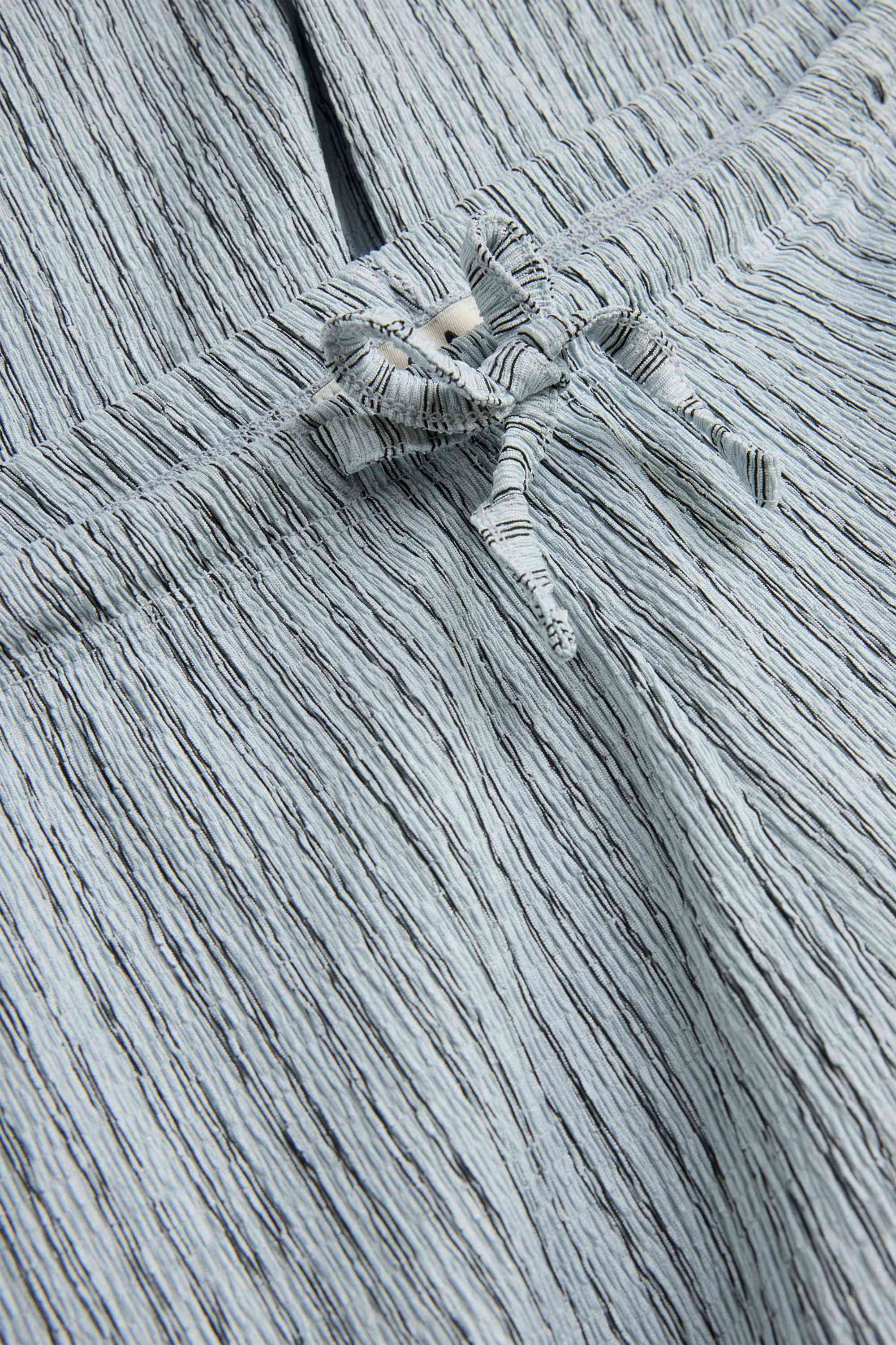 Cloth trousers - mid-rise waist - wide leg - striped light blue