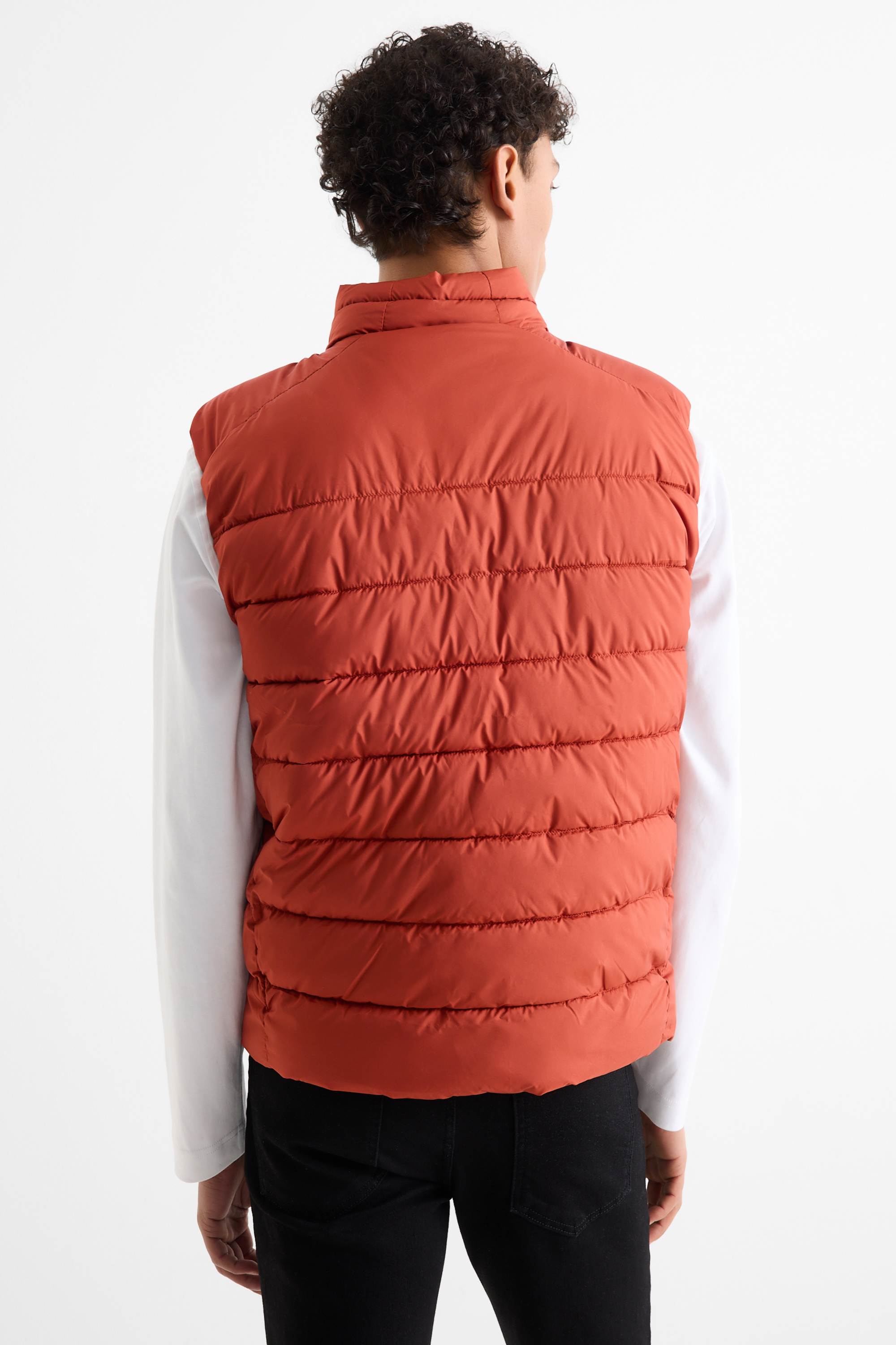 Quilted gilet orange