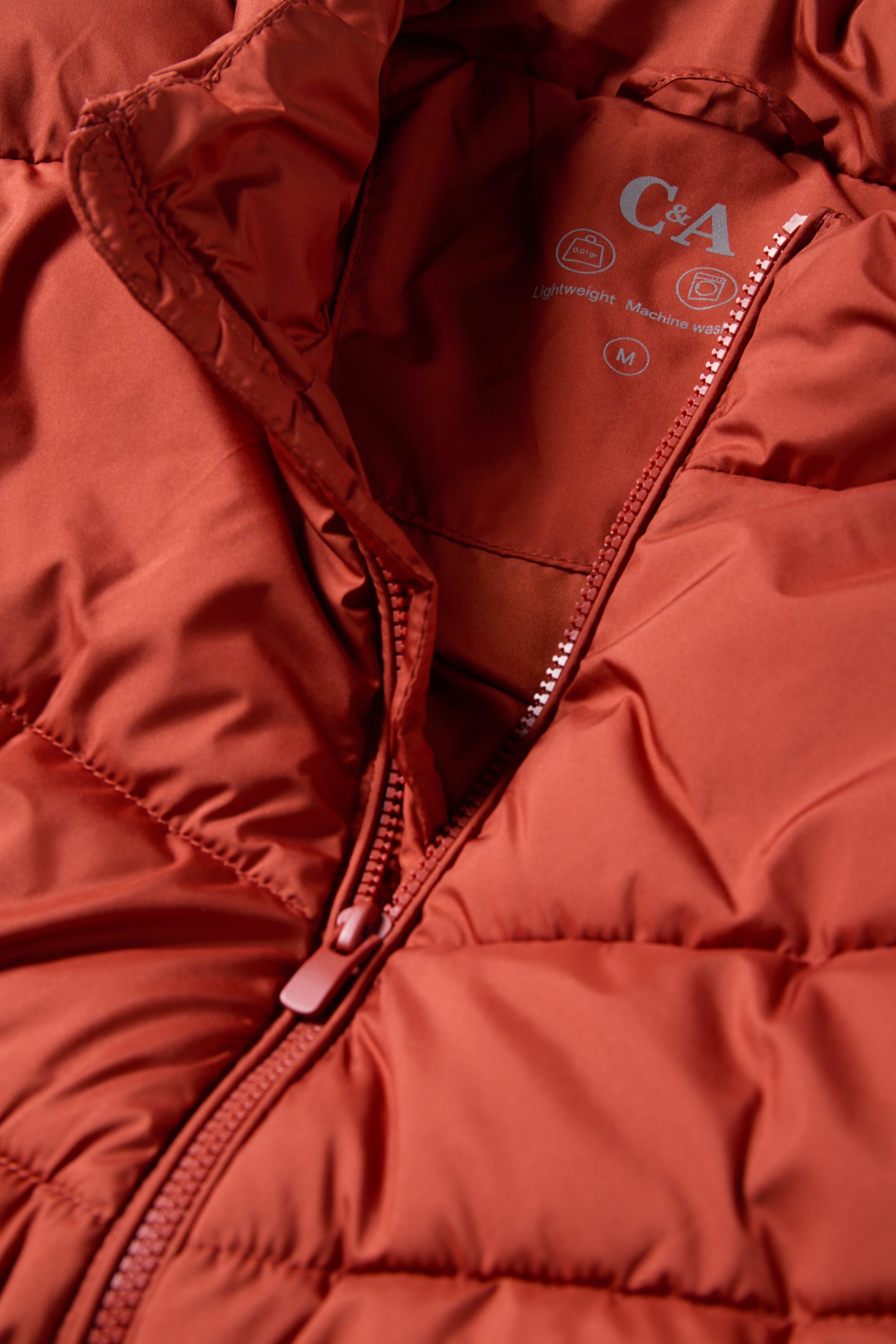 Quilted gilet orange