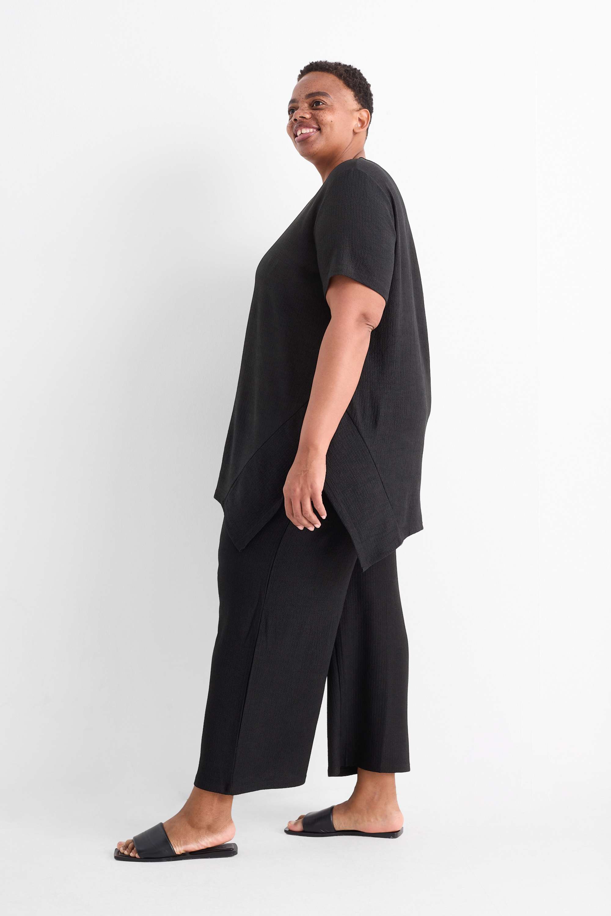 Jersey trousers - mid-rise waist - wide leg - textured black (1)