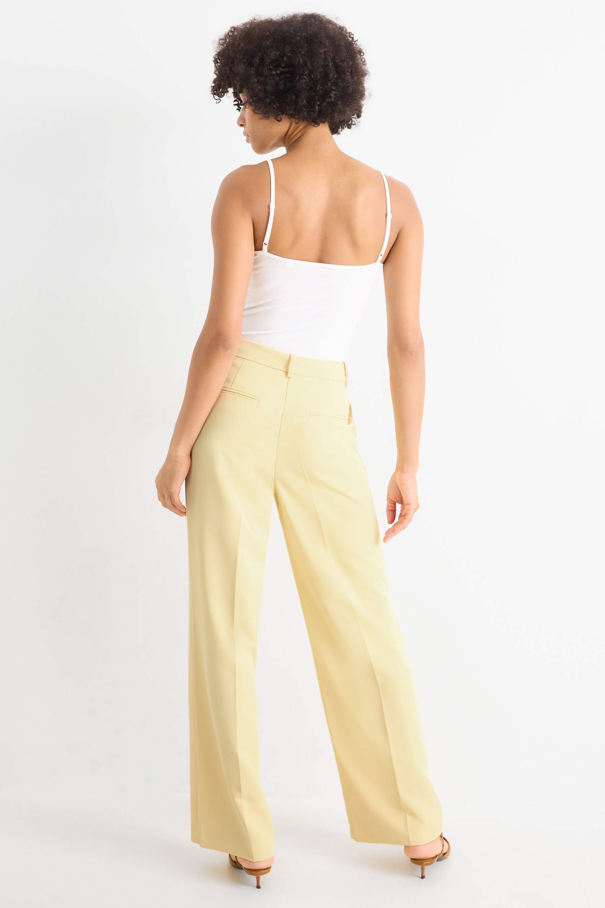 Business trousers - mid-rise waist - wide leg light yellow