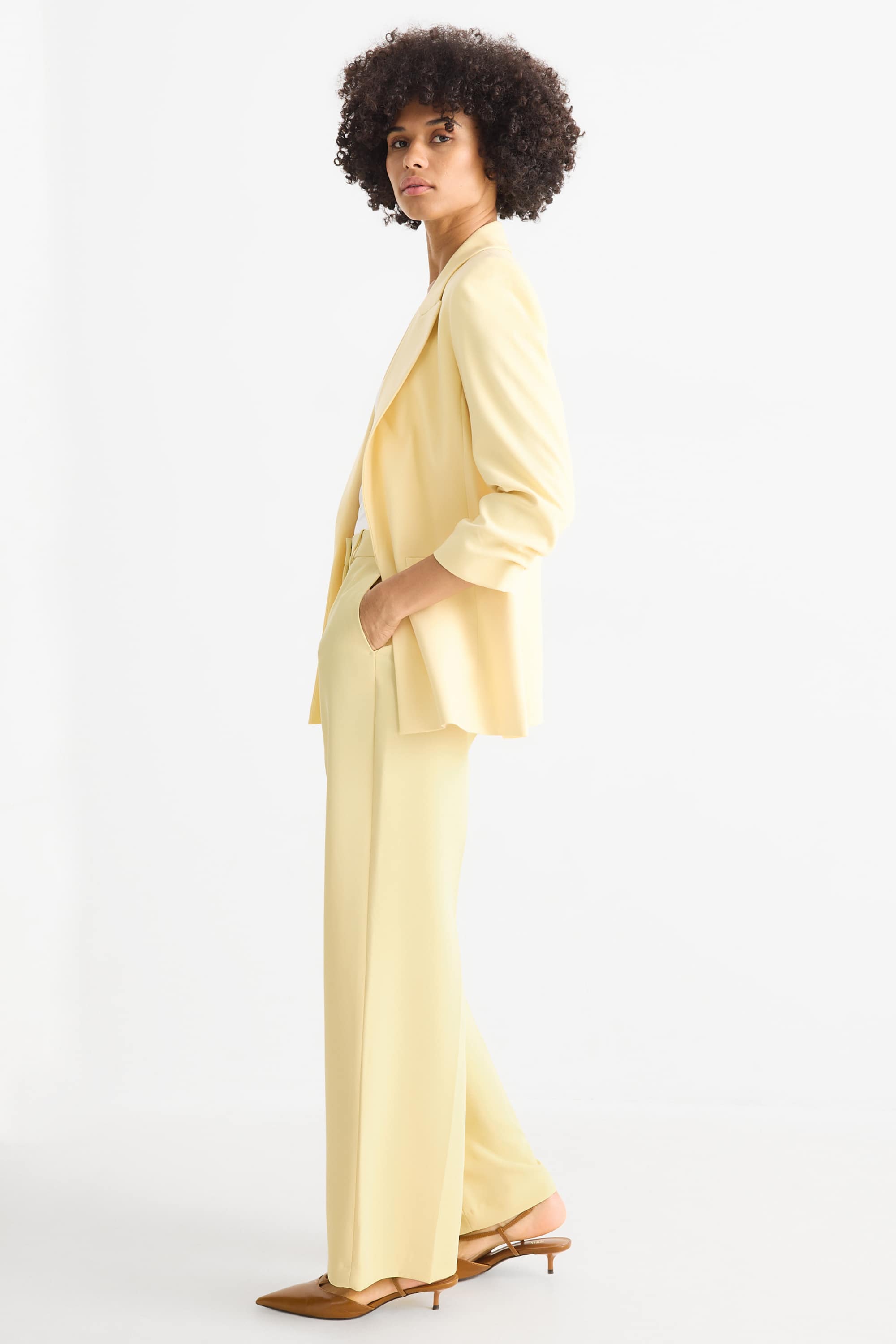 Business trousers - mid-rise waist - wide leg light yellow