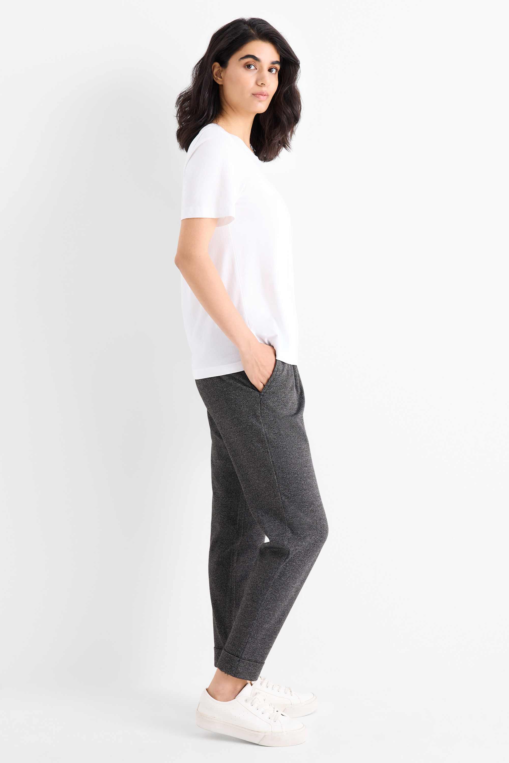 Jersey trousers - mid-rise waist - tapered fit - textured dark gray