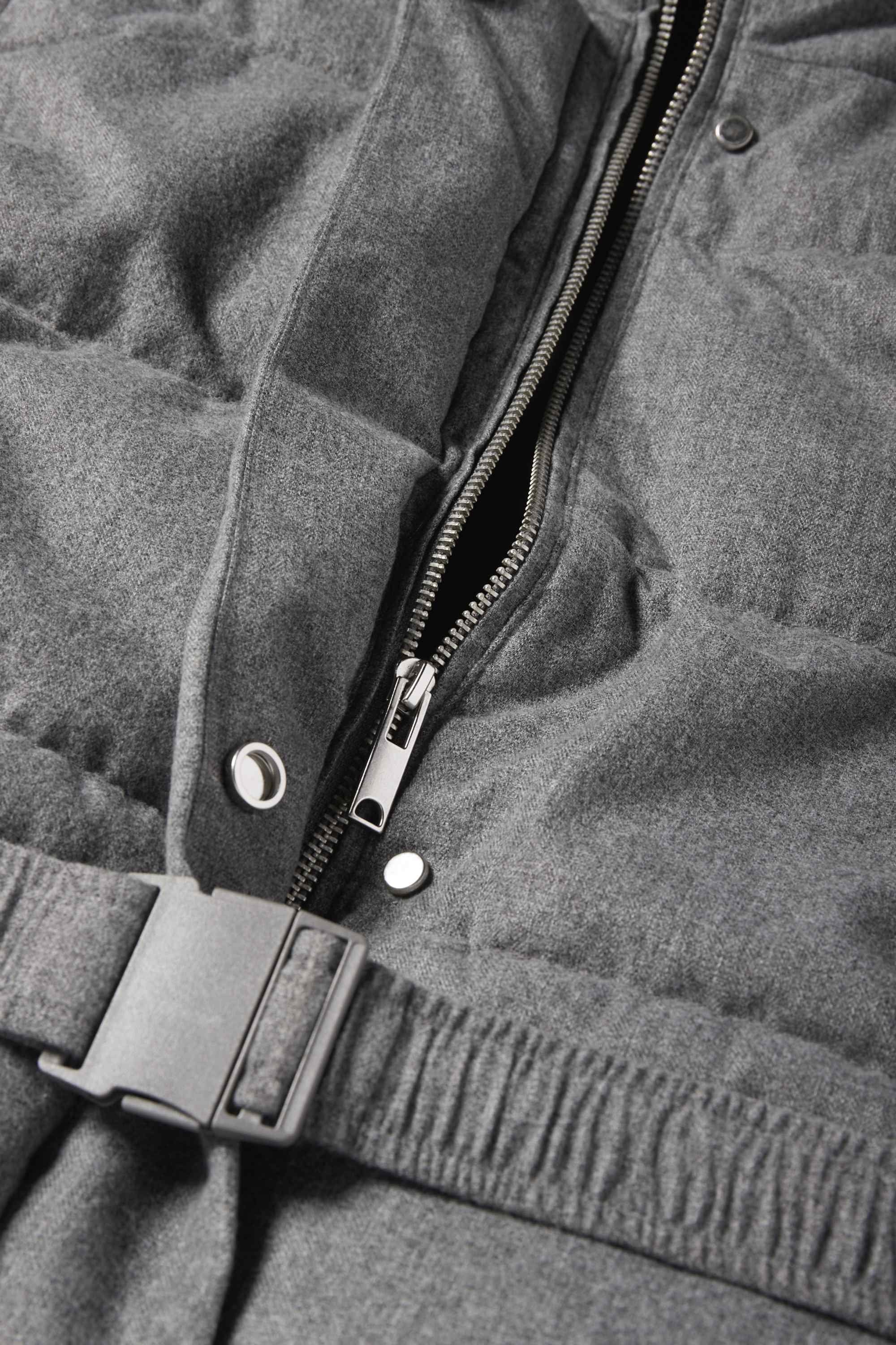 Quilted gilet with belt gray