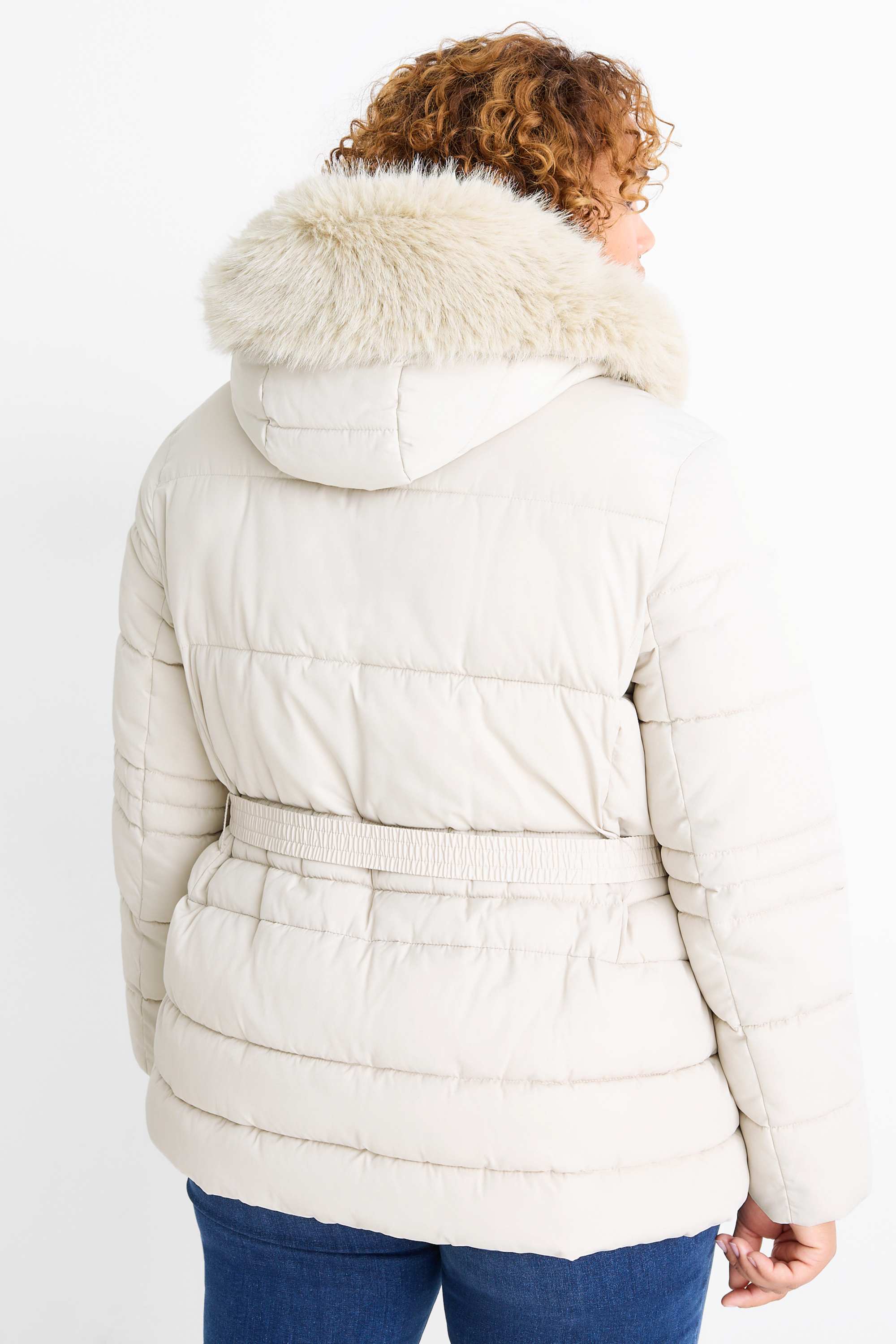 Quilted jacket with belt, hood and faux fur trim light beige