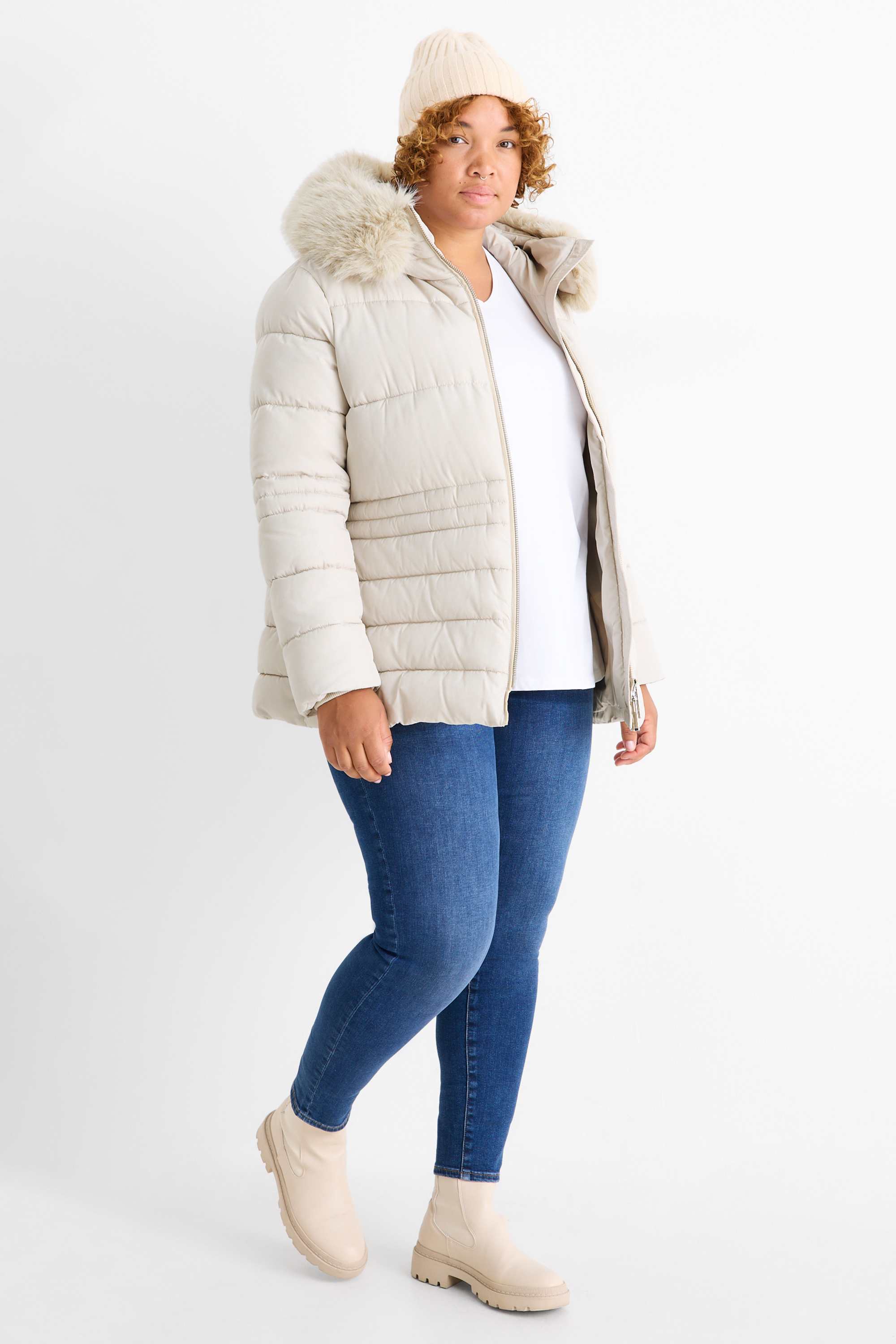 Quilted jacket with belt, hood and faux fur trim light beige