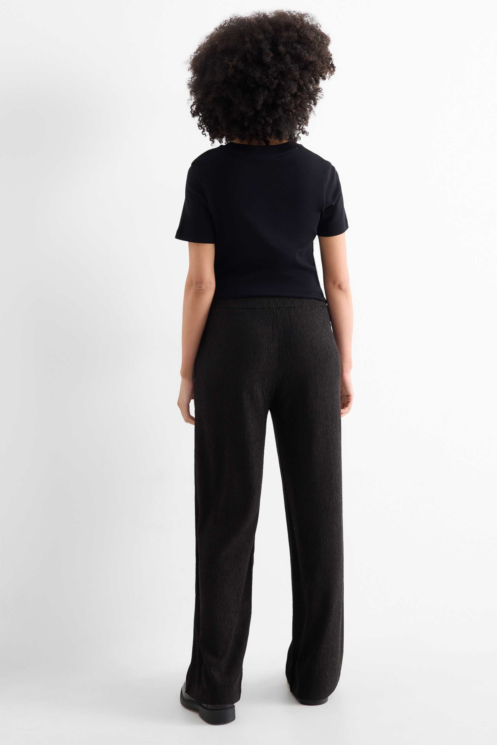 Jersey trousers - mid-rise waist - textured black