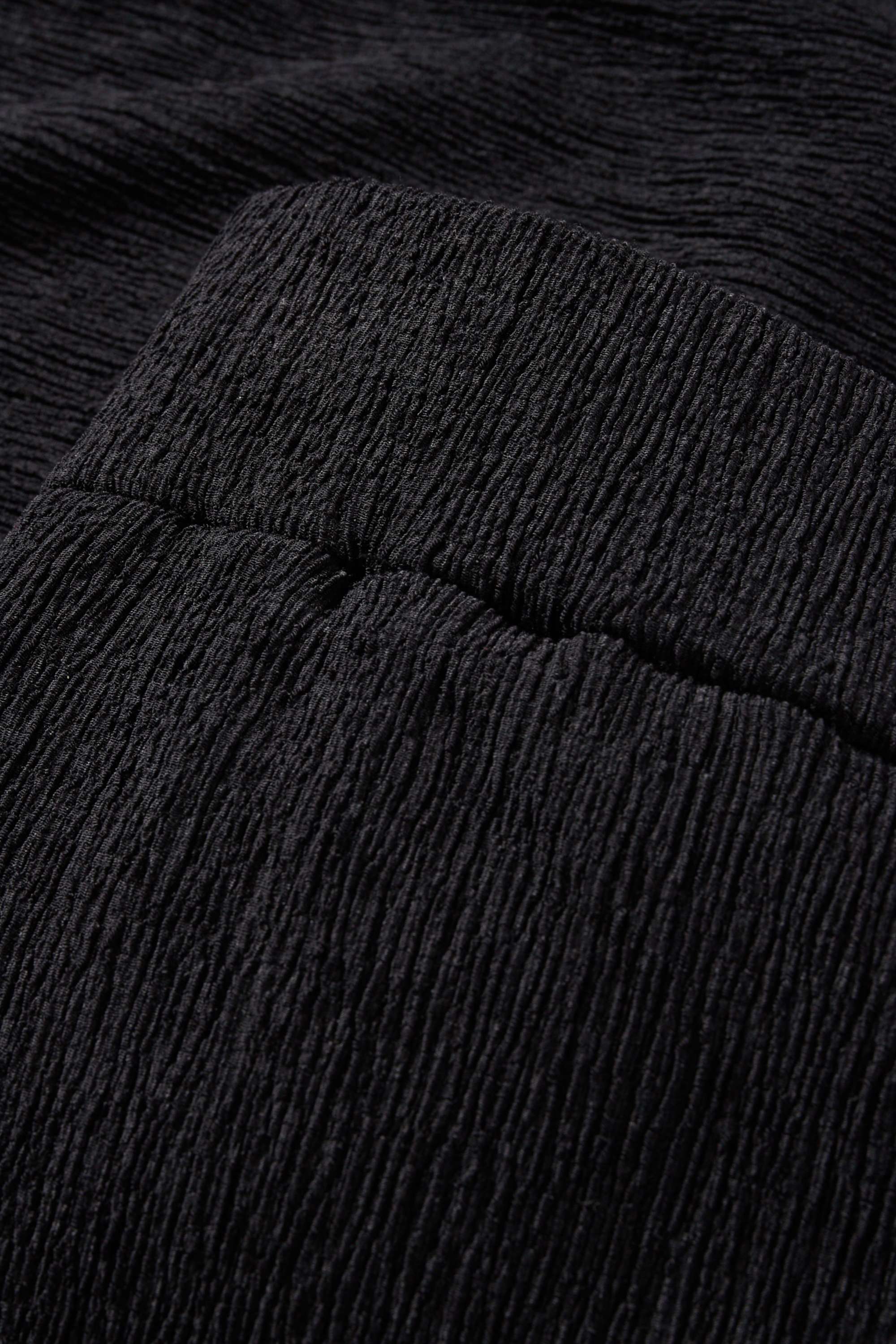 Jersey trousers - mid-rise waist - textured black