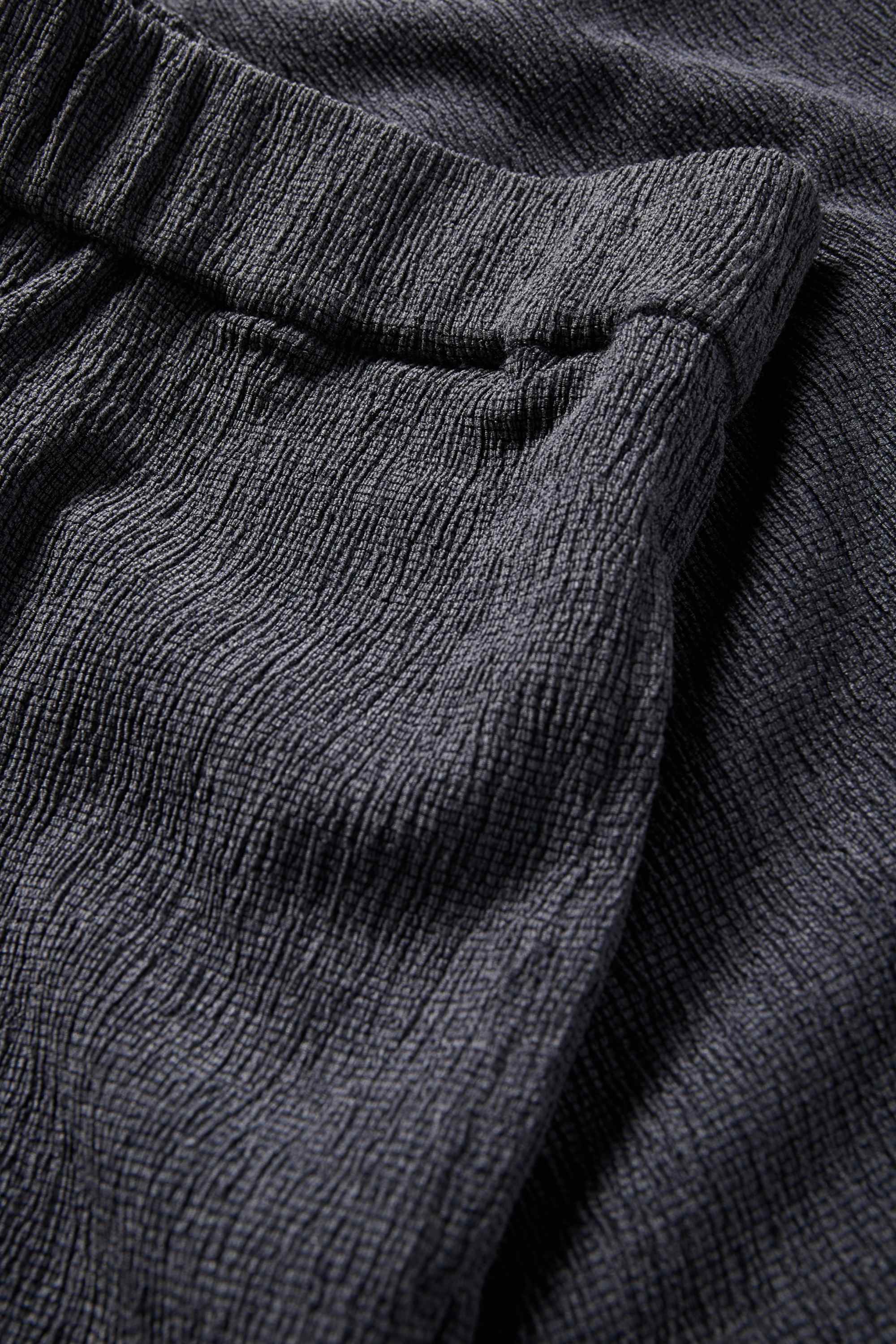 Jersey trousers - mid-rise waist - textured dark gray
