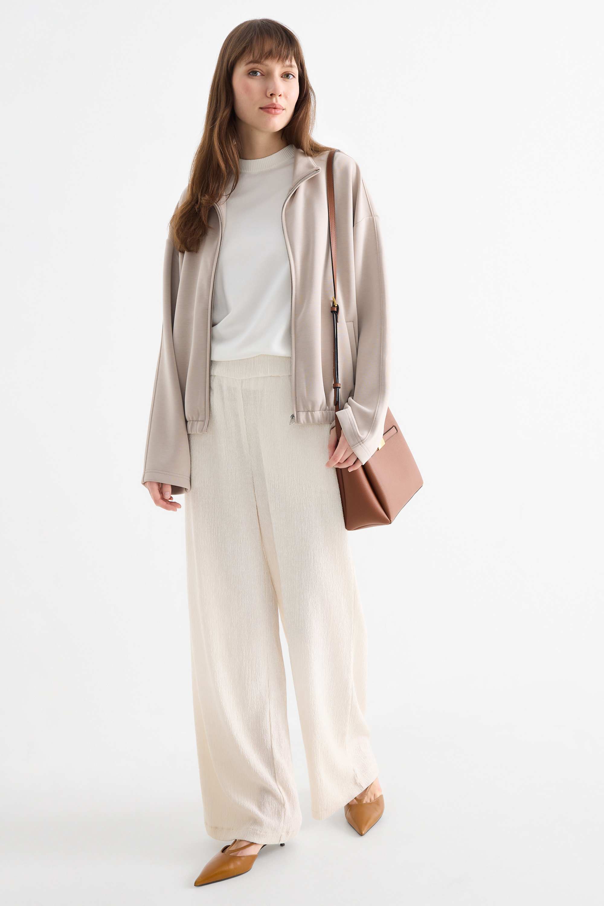 Jersey trousers - mid-rise waist - textured light beige