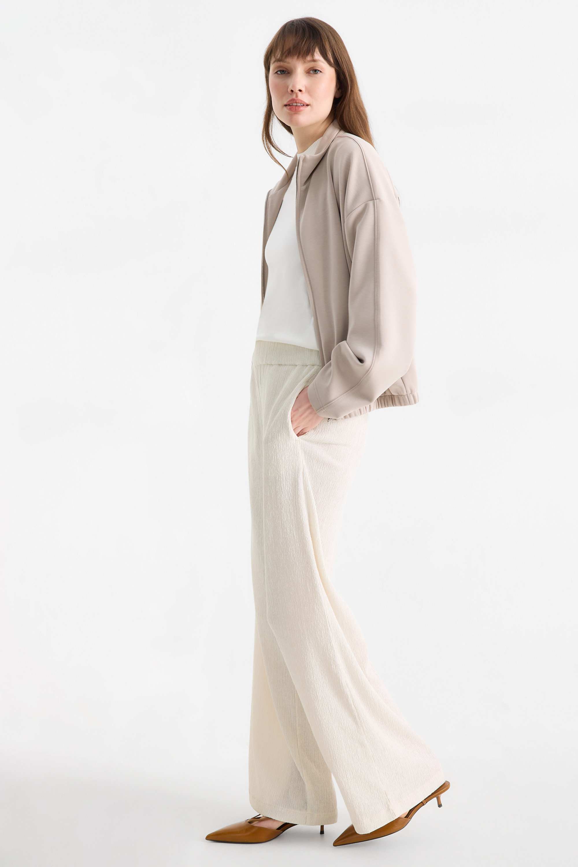 Jersey trousers - mid-rise waist - textured light beige