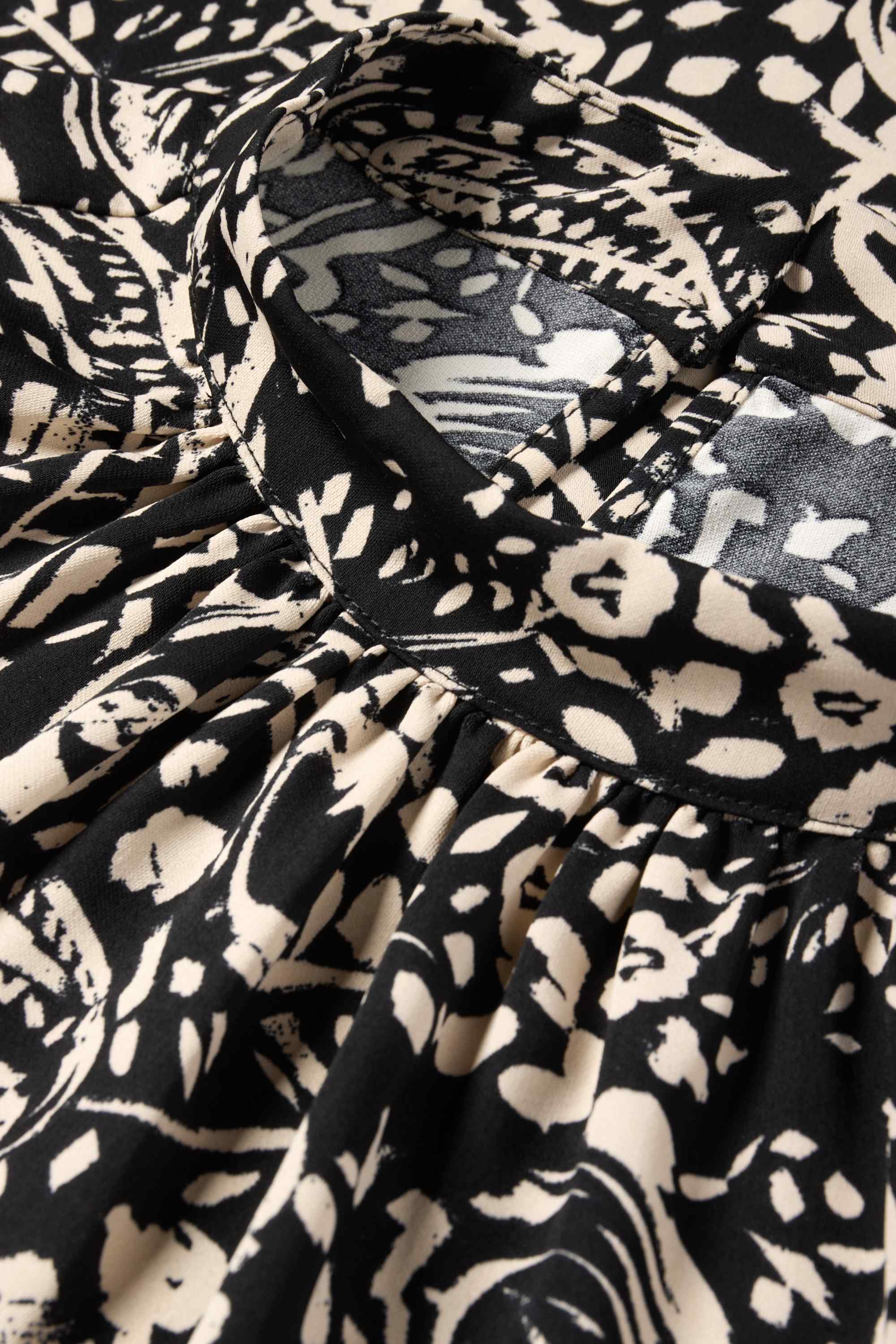 Blouse - patterned black / beige