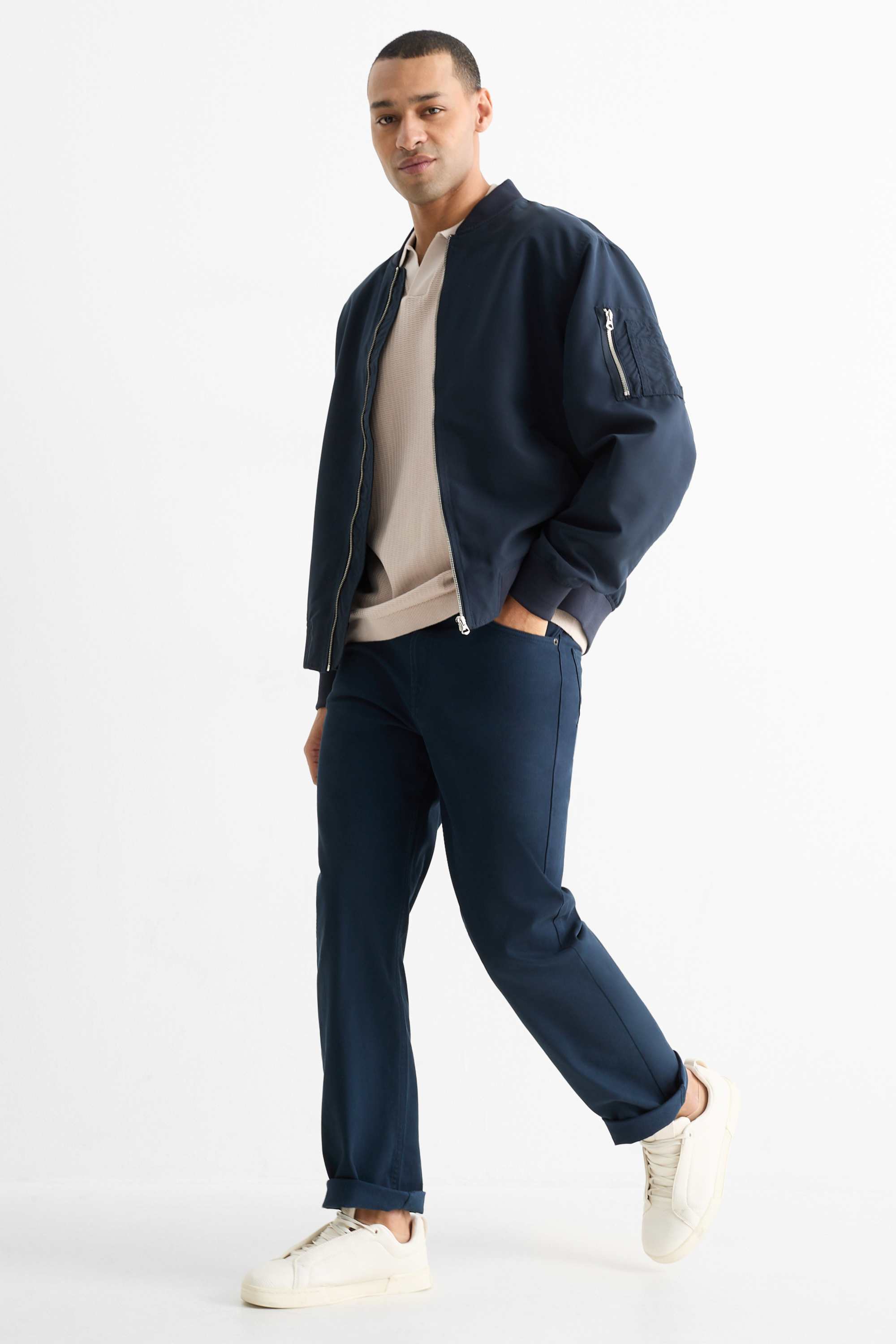 Knitted polo shirt - relaxed fit - textured light beige