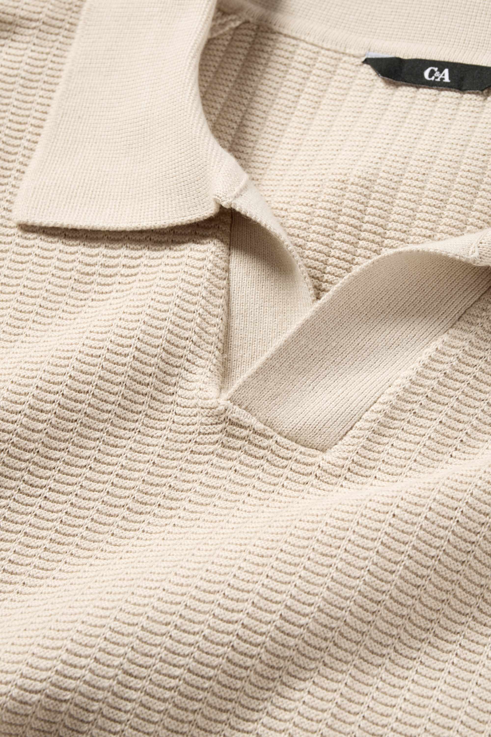 Knitted polo shirt - relaxed fit - textured light beige