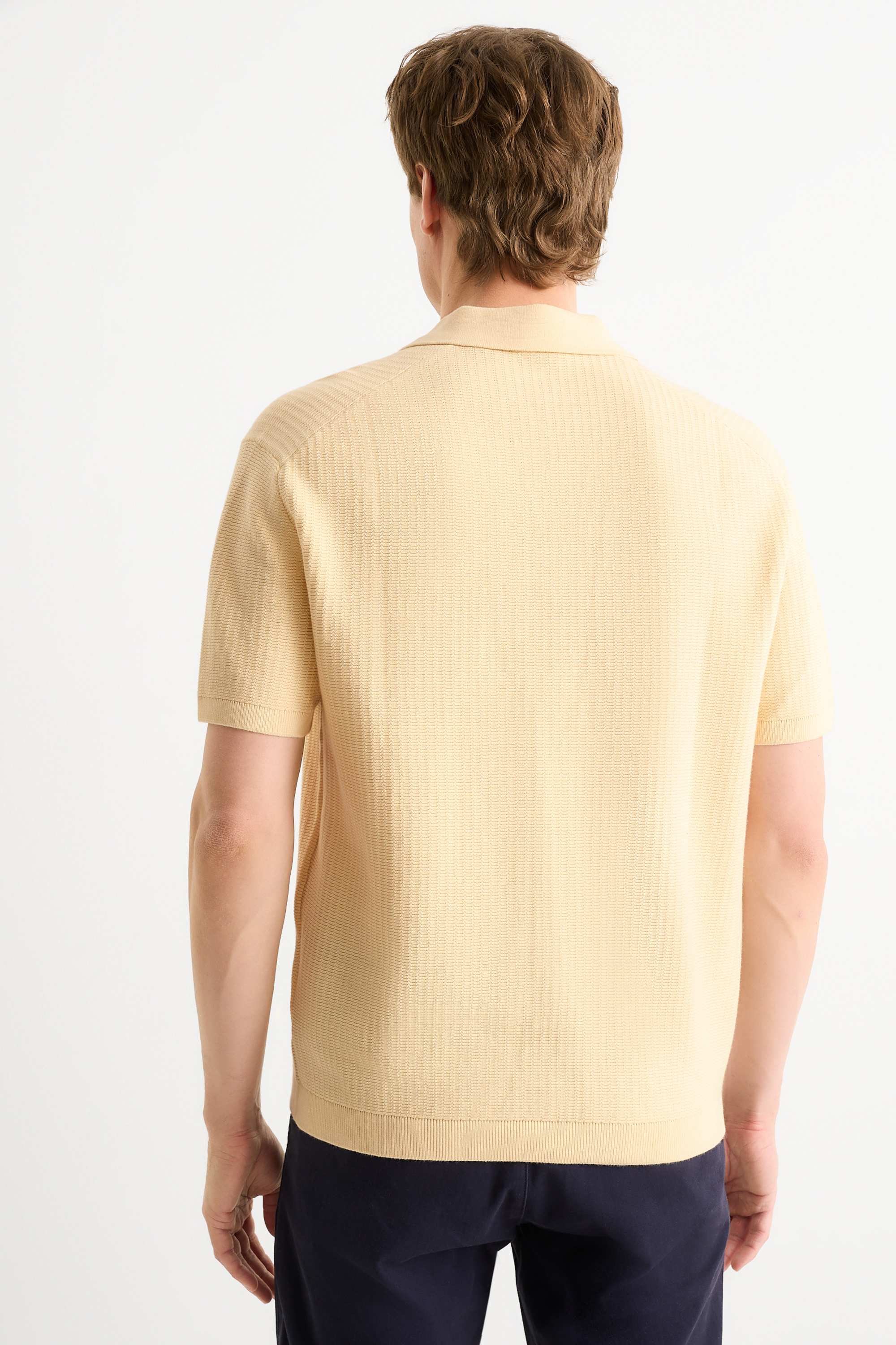 Knitted polo shirt - relaxed fit - textured light yellow