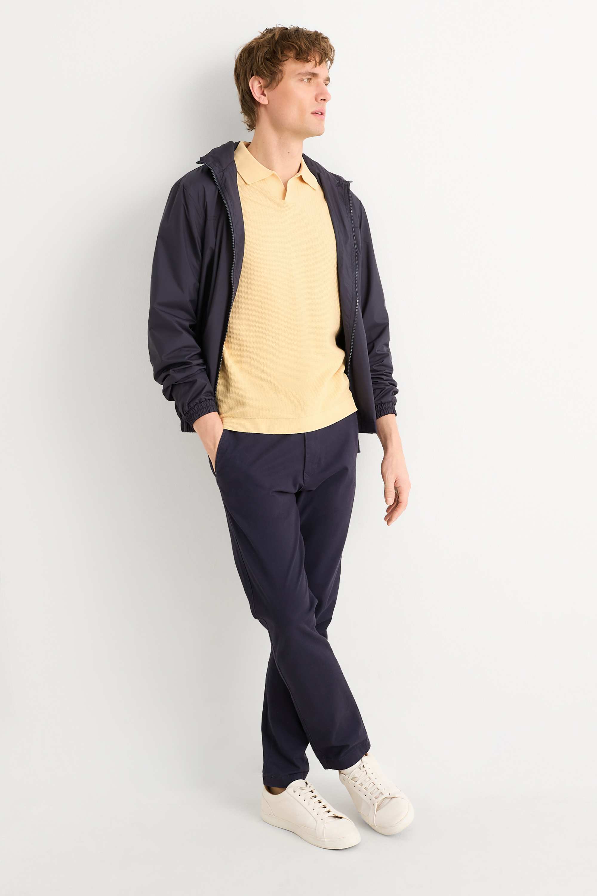 Knitted polo shirt - relaxed fit - textured light yellow
