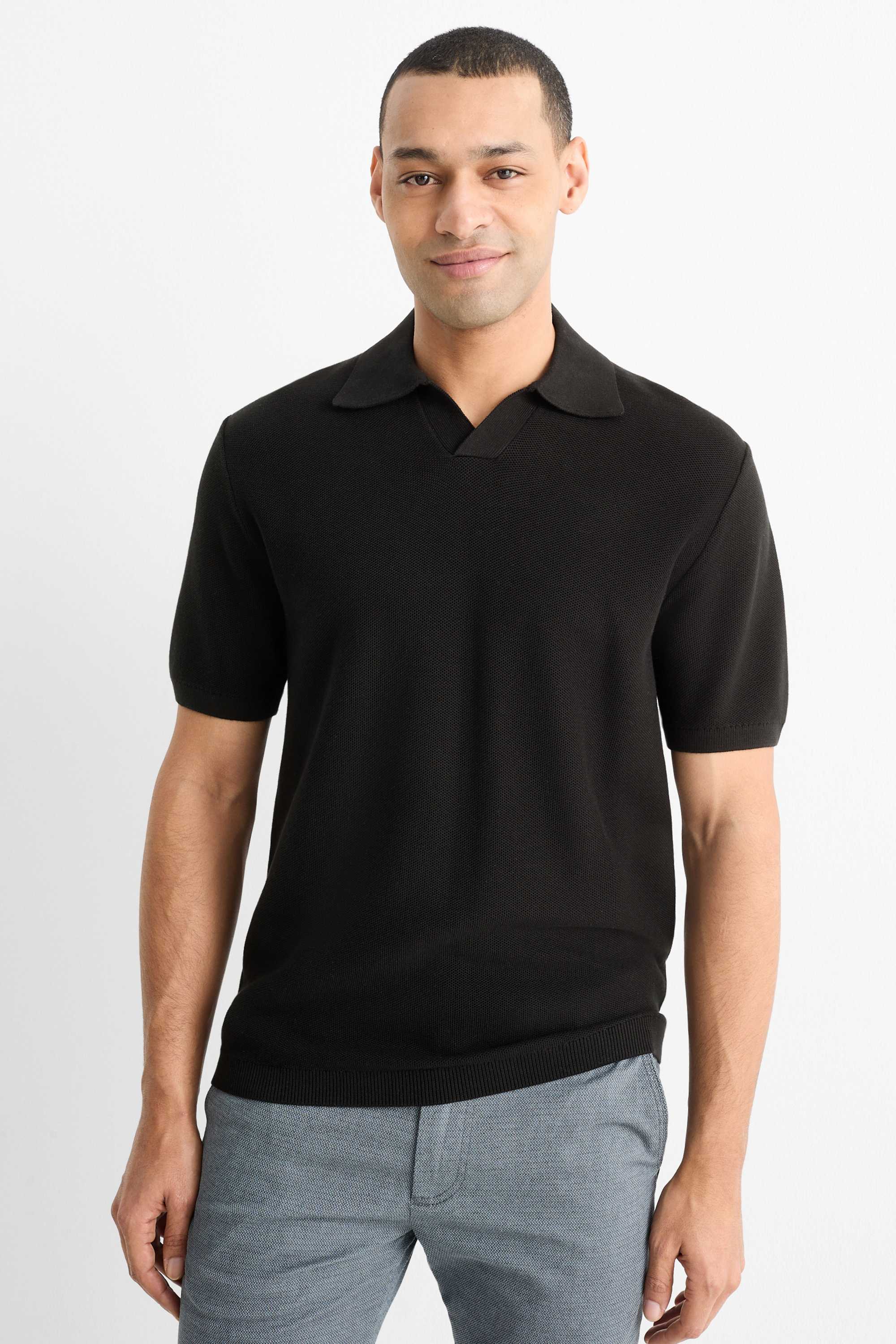 Knitted polo shirt - regular fit - textured black