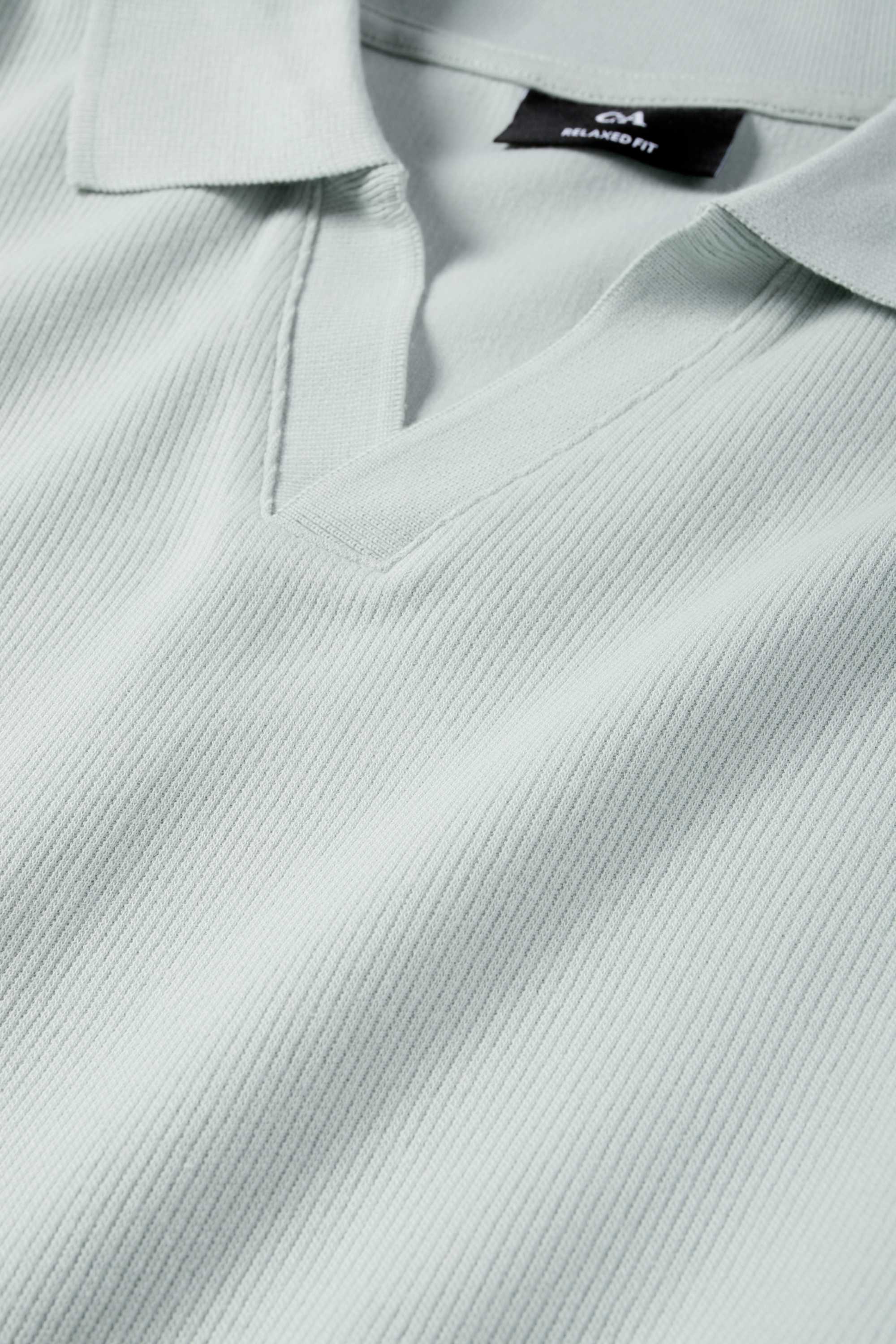 Knitted polo shirt - relaxed fit - ribbed mint green
