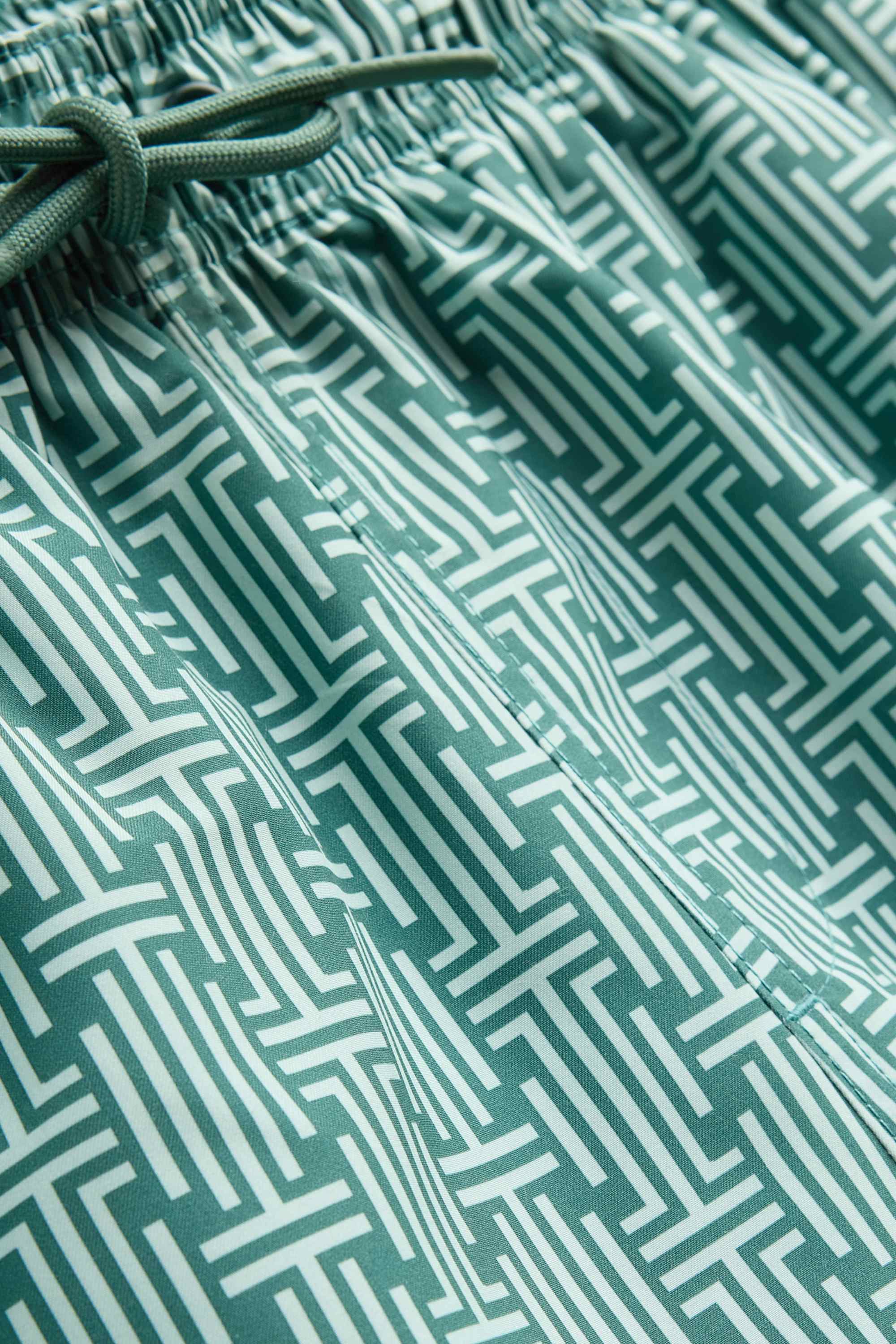 Swim shorts - patterned green