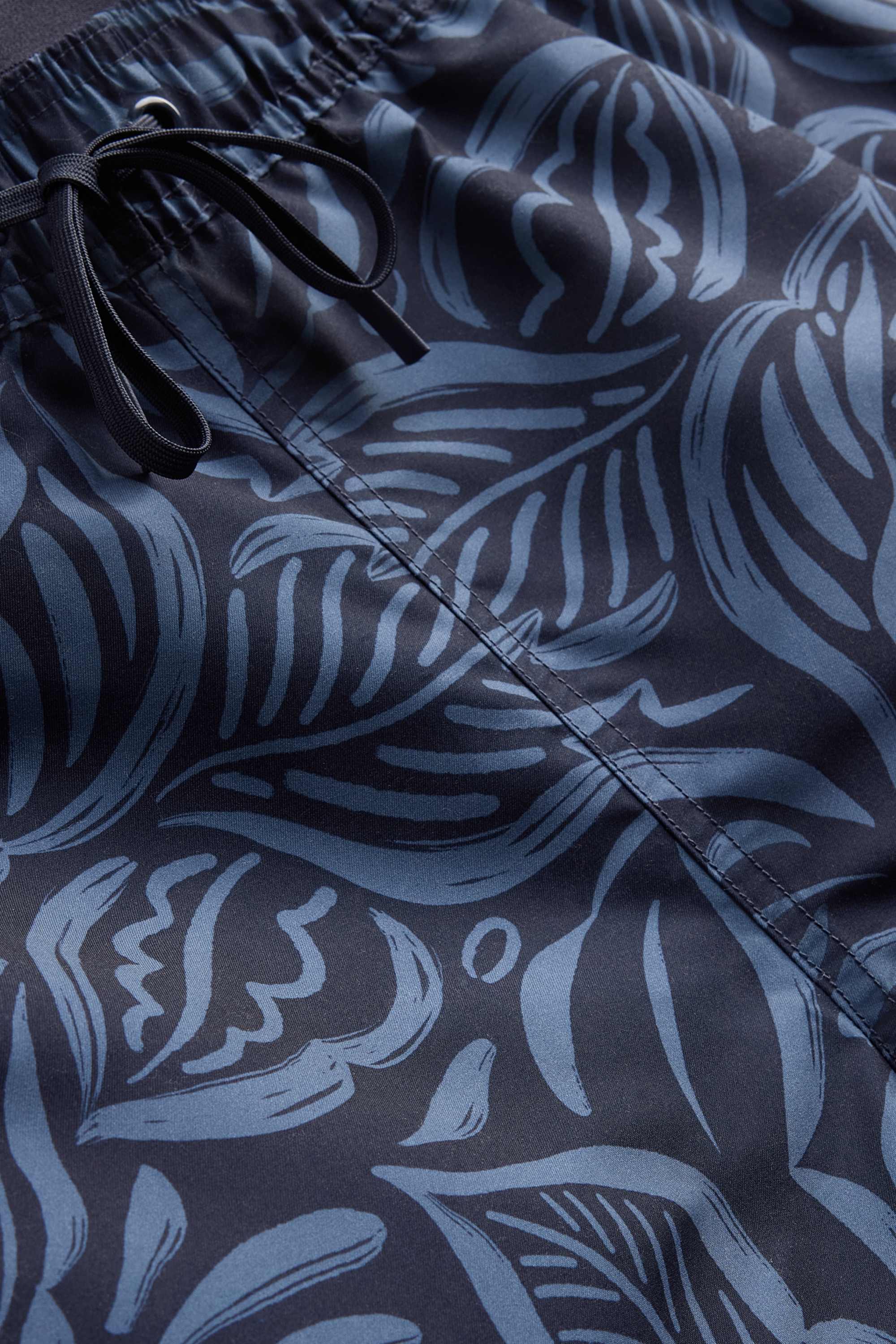 Swim shorts - patterned dark blue