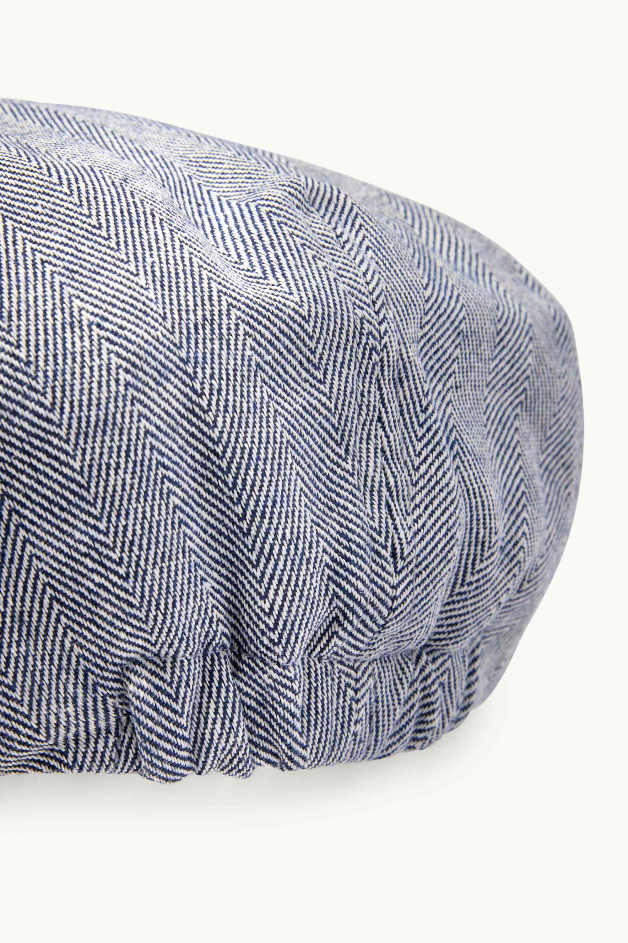 Flat cap with linen content - patterned blue