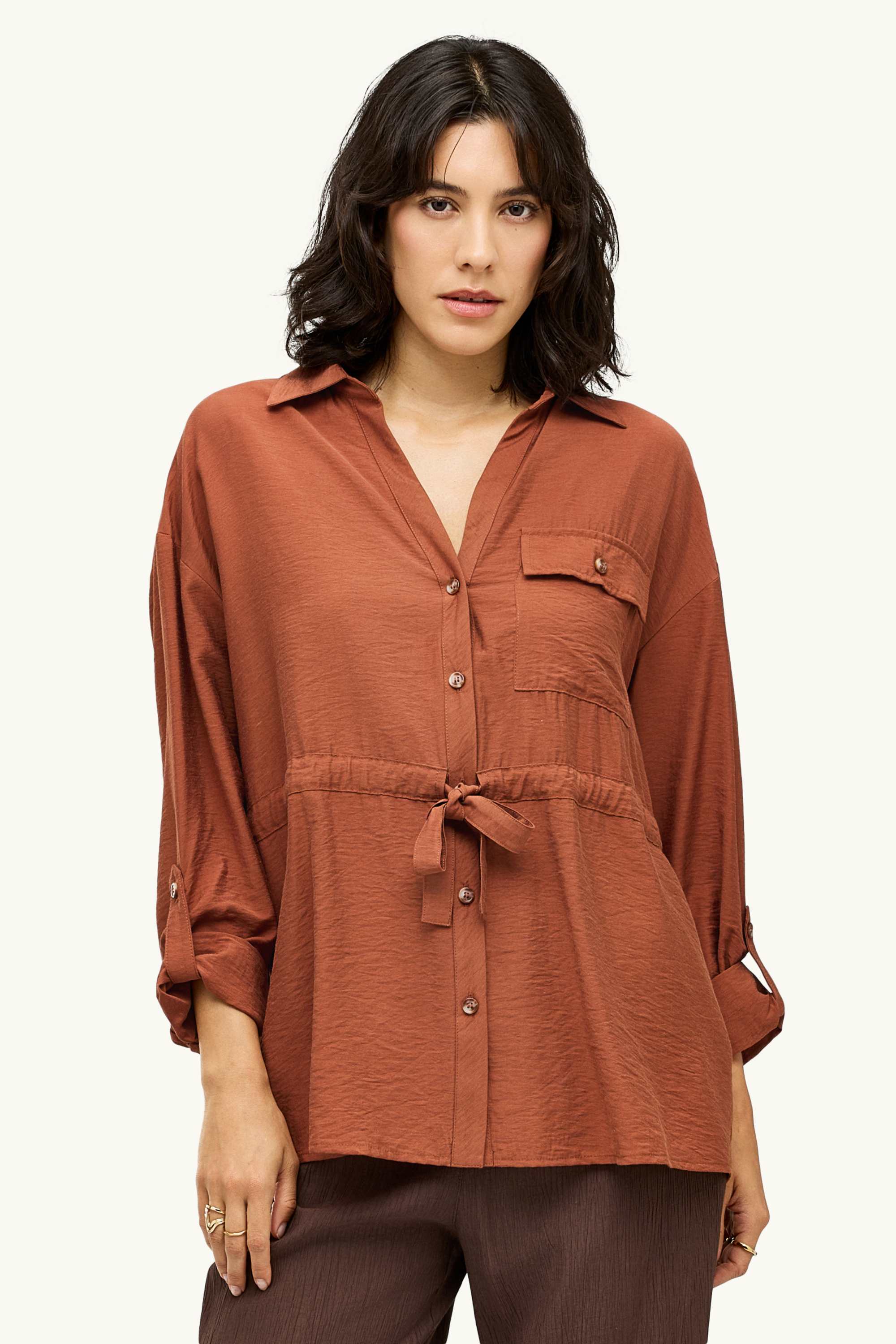 Linen blouse with knot detail and V-neck rust