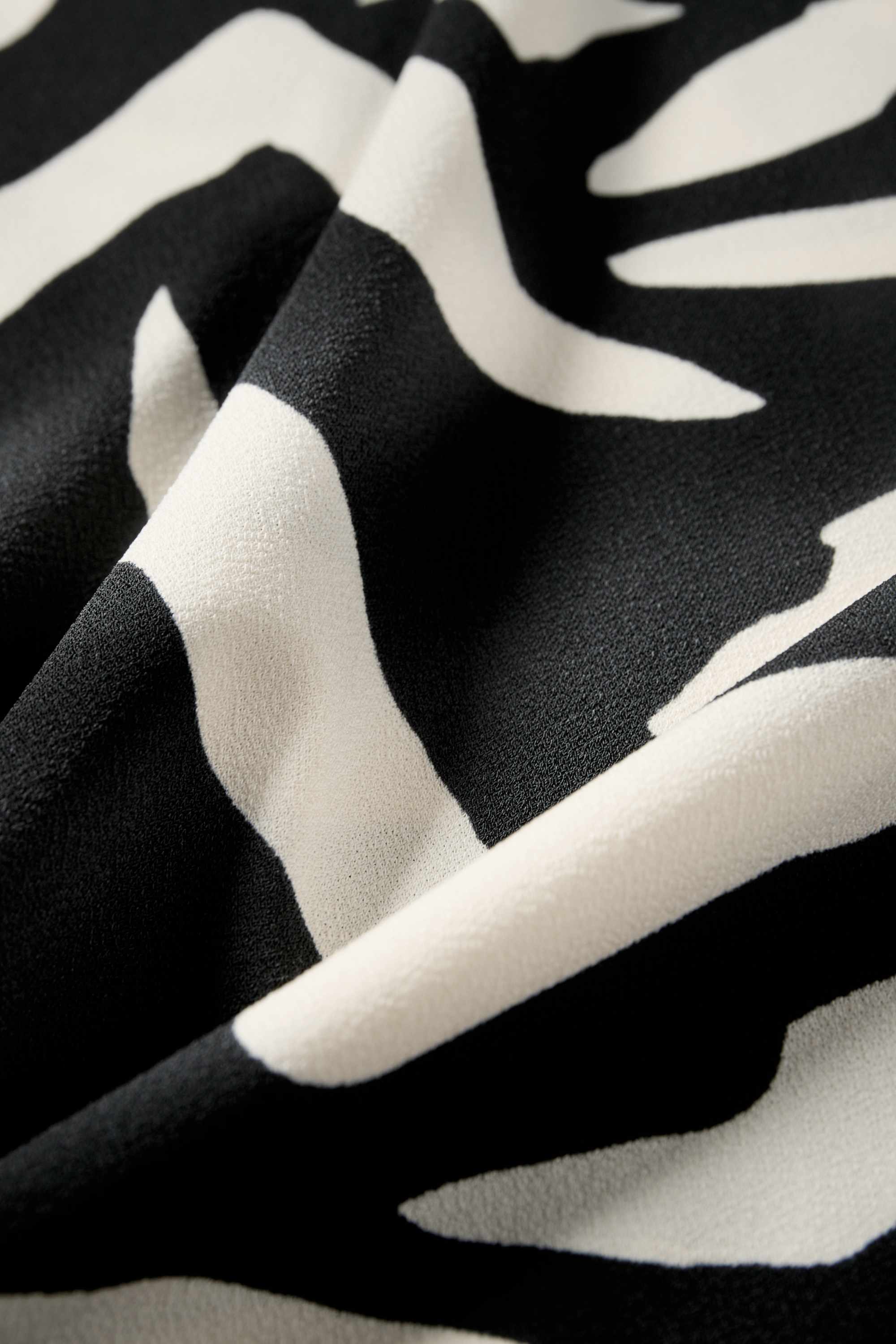 Skirt - patterned black / beige
