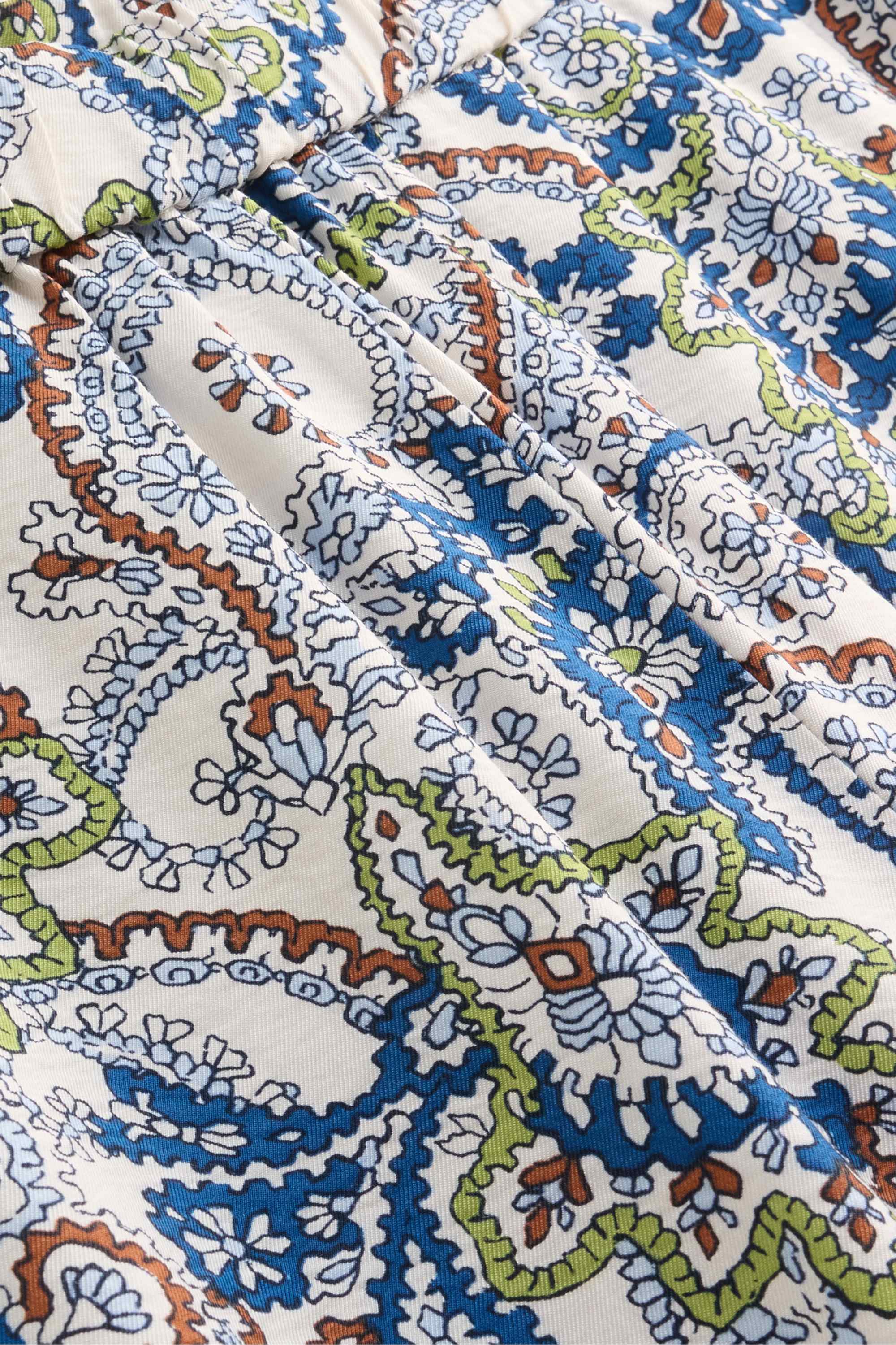 Cloth trousers - high waist - wide leg - patterned white / blue