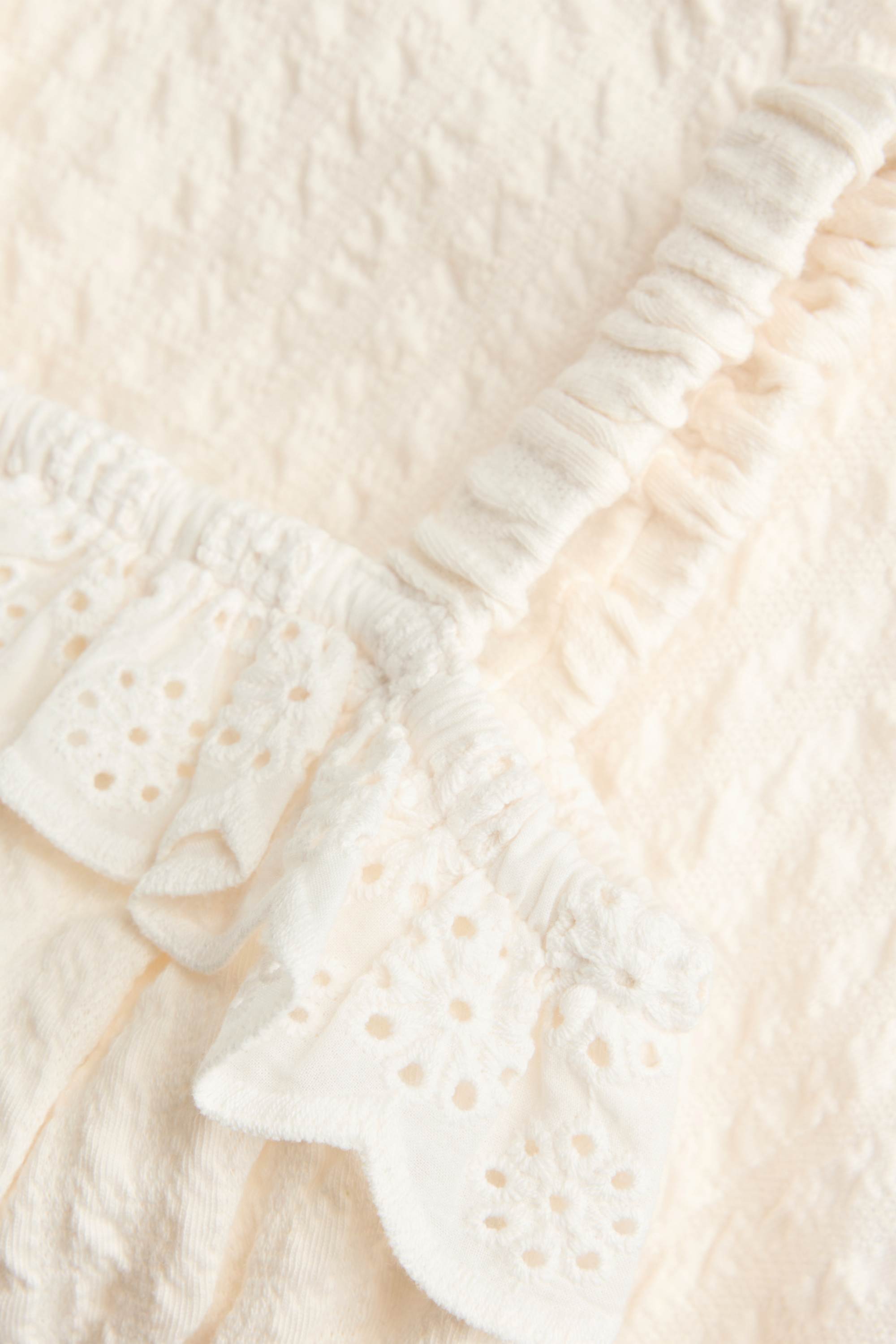Baby jumpsuit white