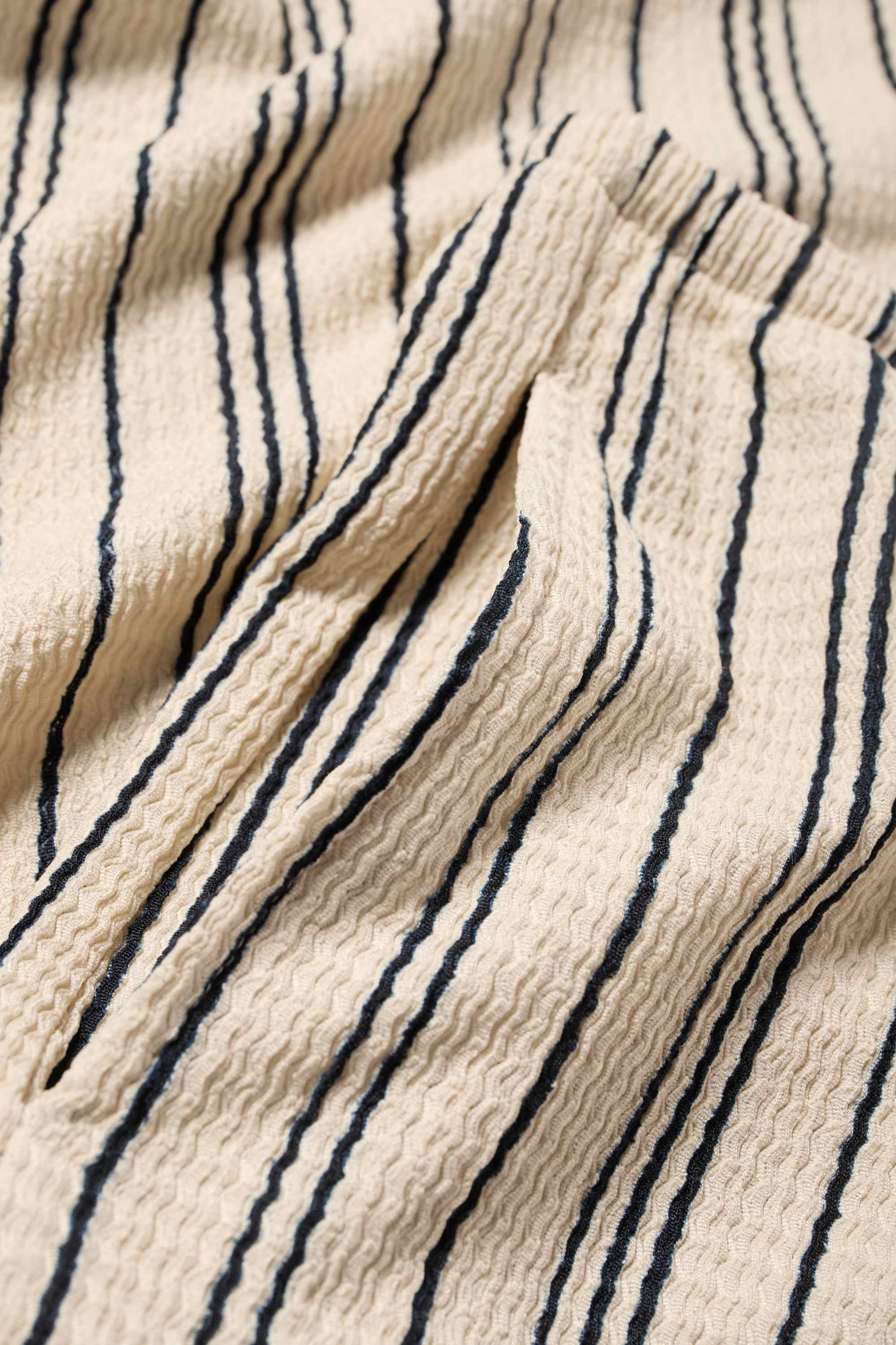 Jersey trousers - striped beige