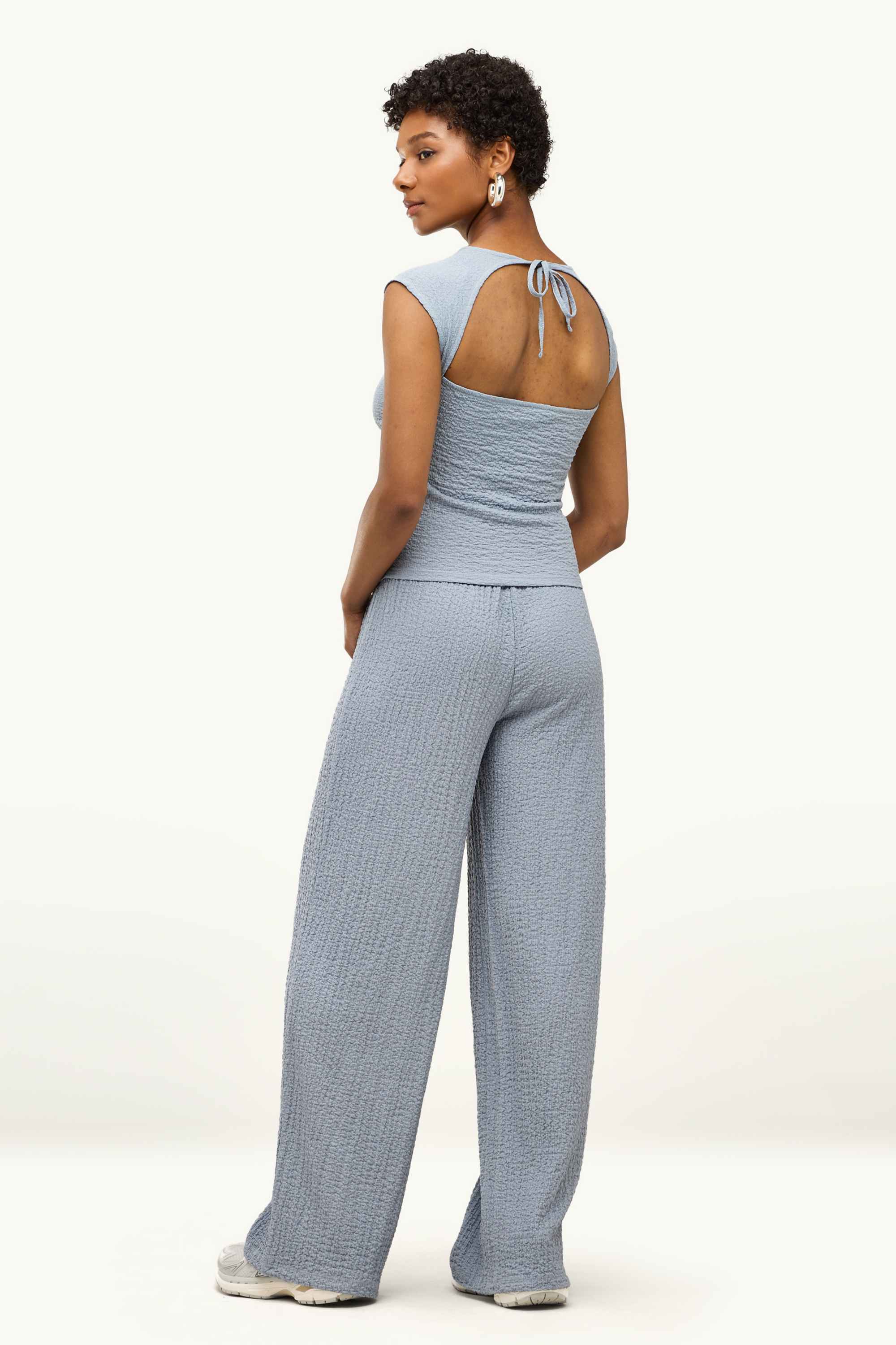 Cloth trousers - mid-rise waist - loose fit - textured light gray