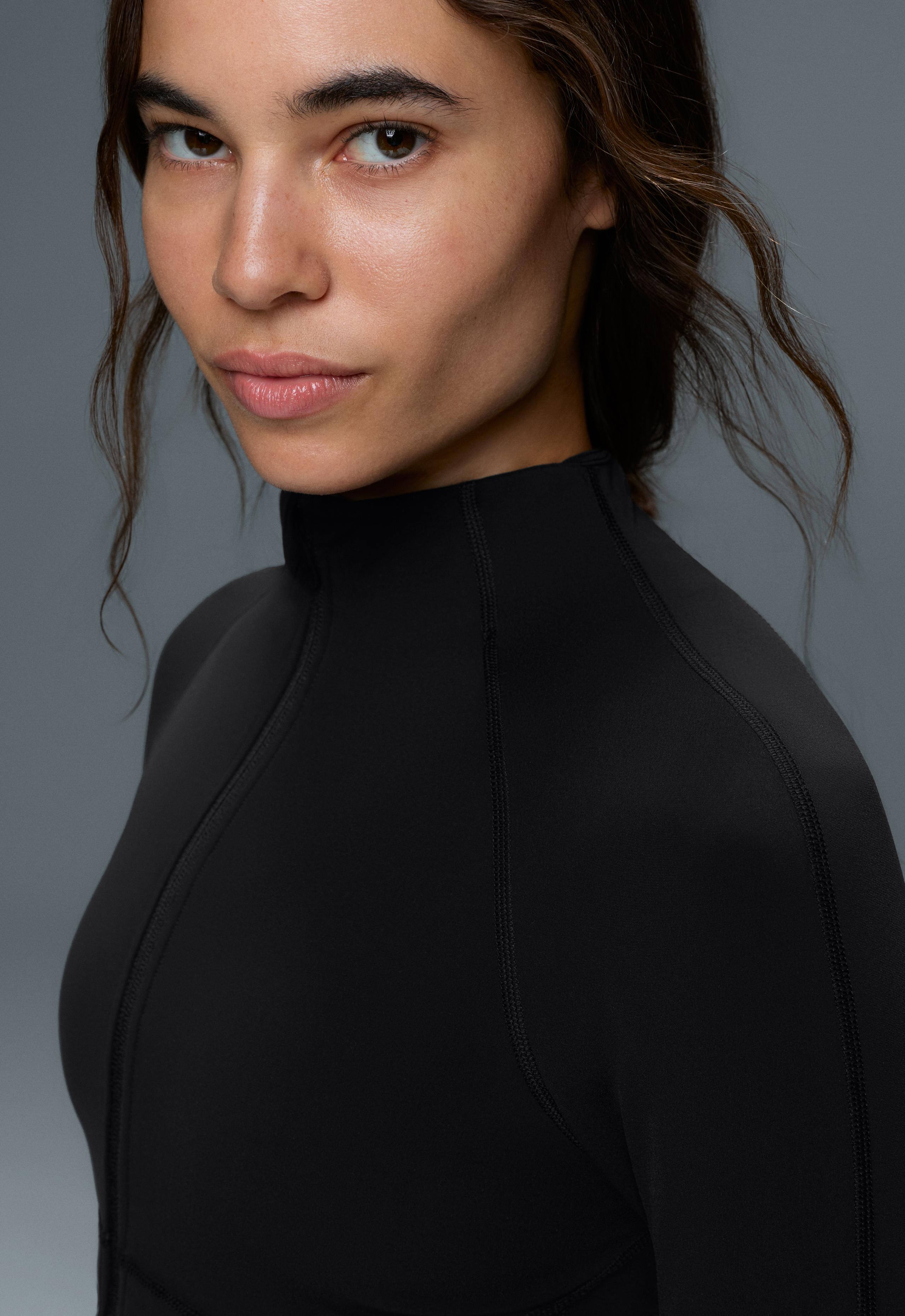 Light warm technical jacket with seams - BLACK