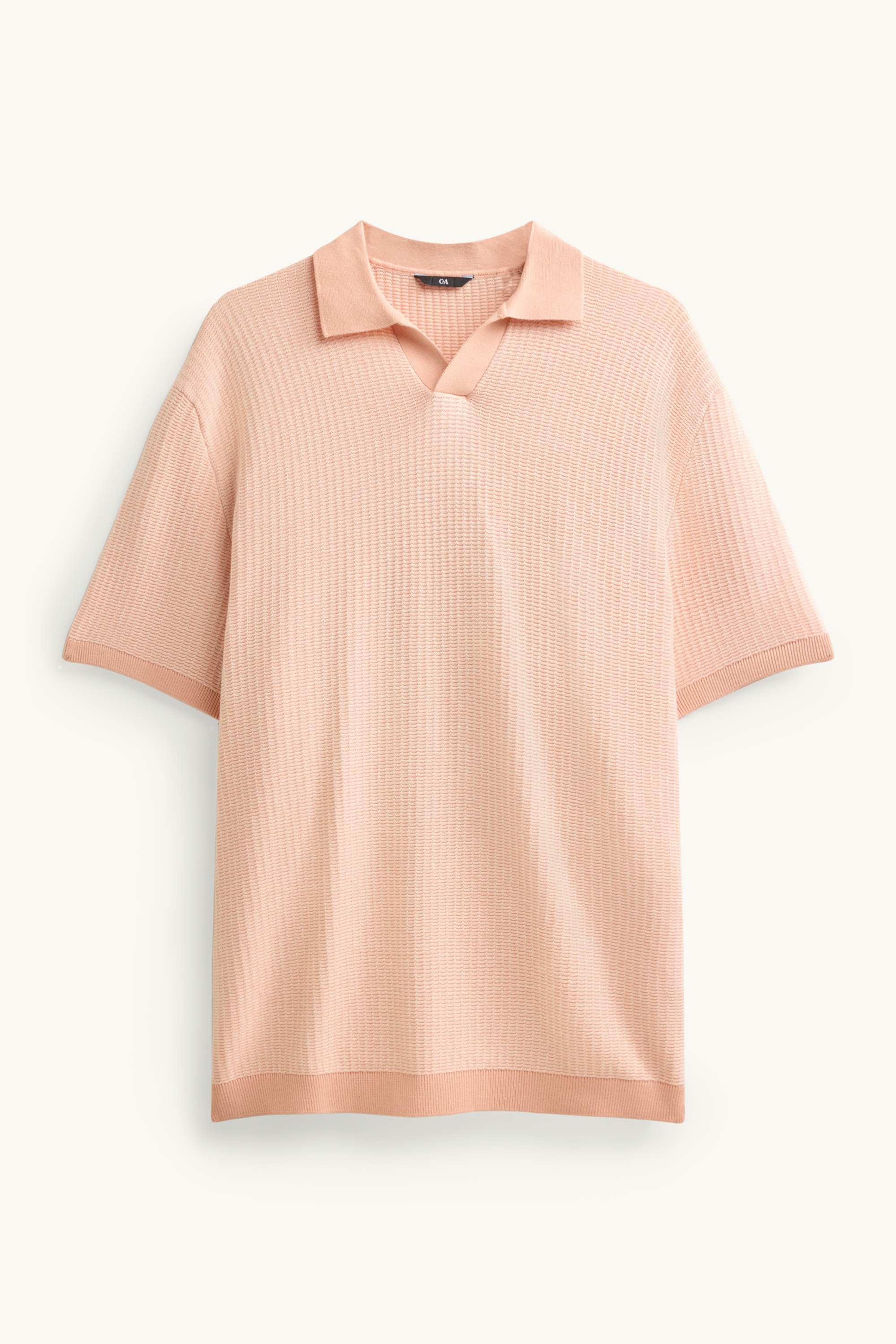 Knitted polo shirt - relaxed fit - textured orange