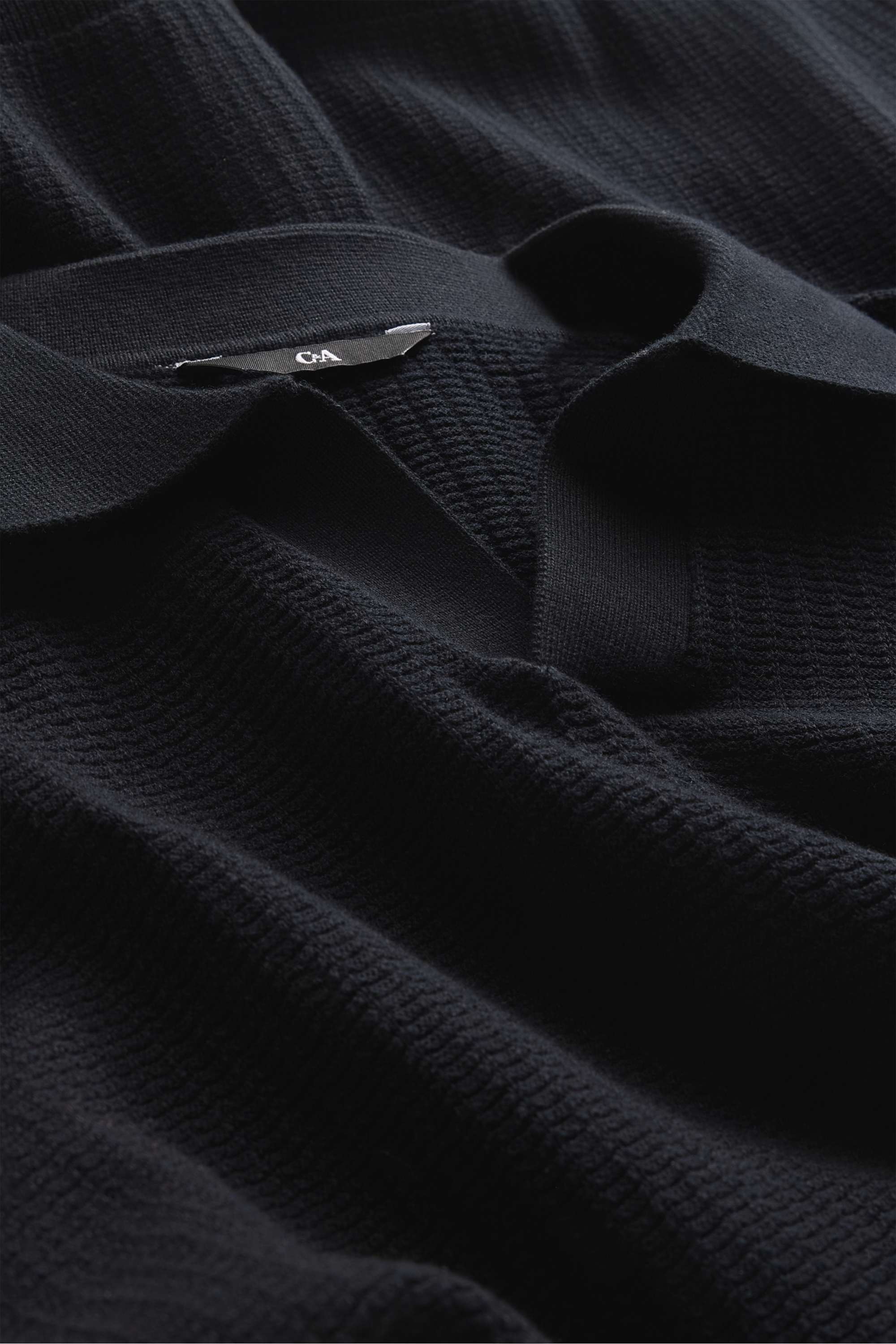 Knitted polo shirt - relaxed fit - textured black