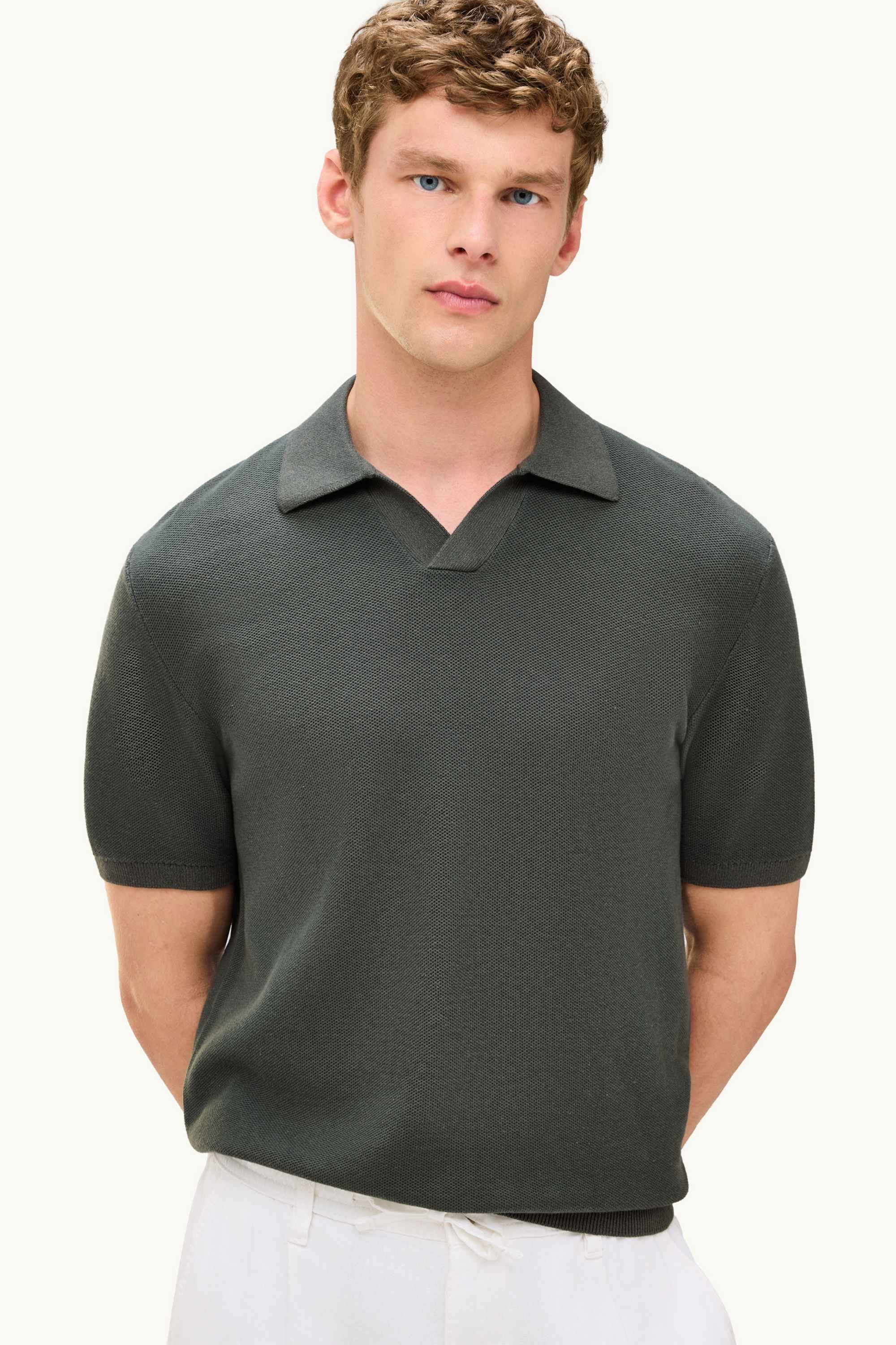Knitted polo shirt - regular fit - textured dark green