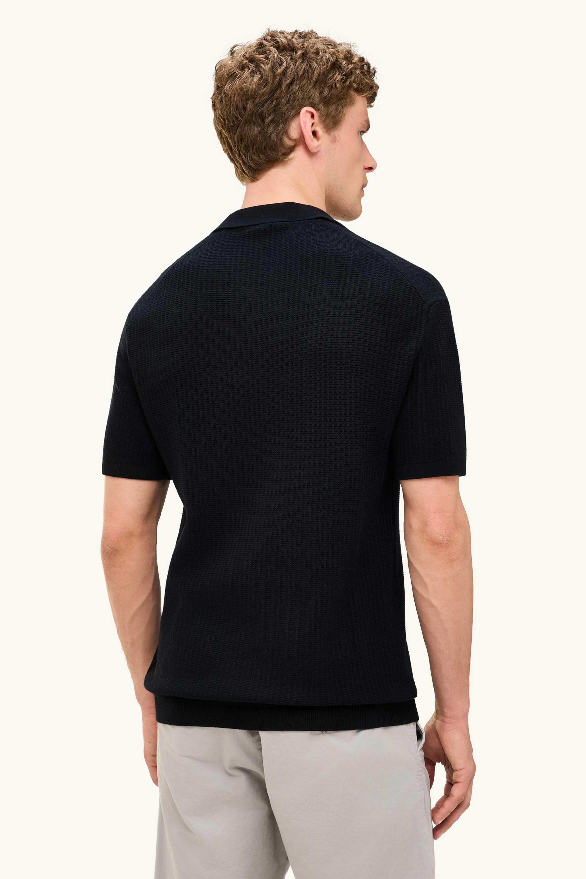 Knitted polo shirt - relaxed fit - textured black
