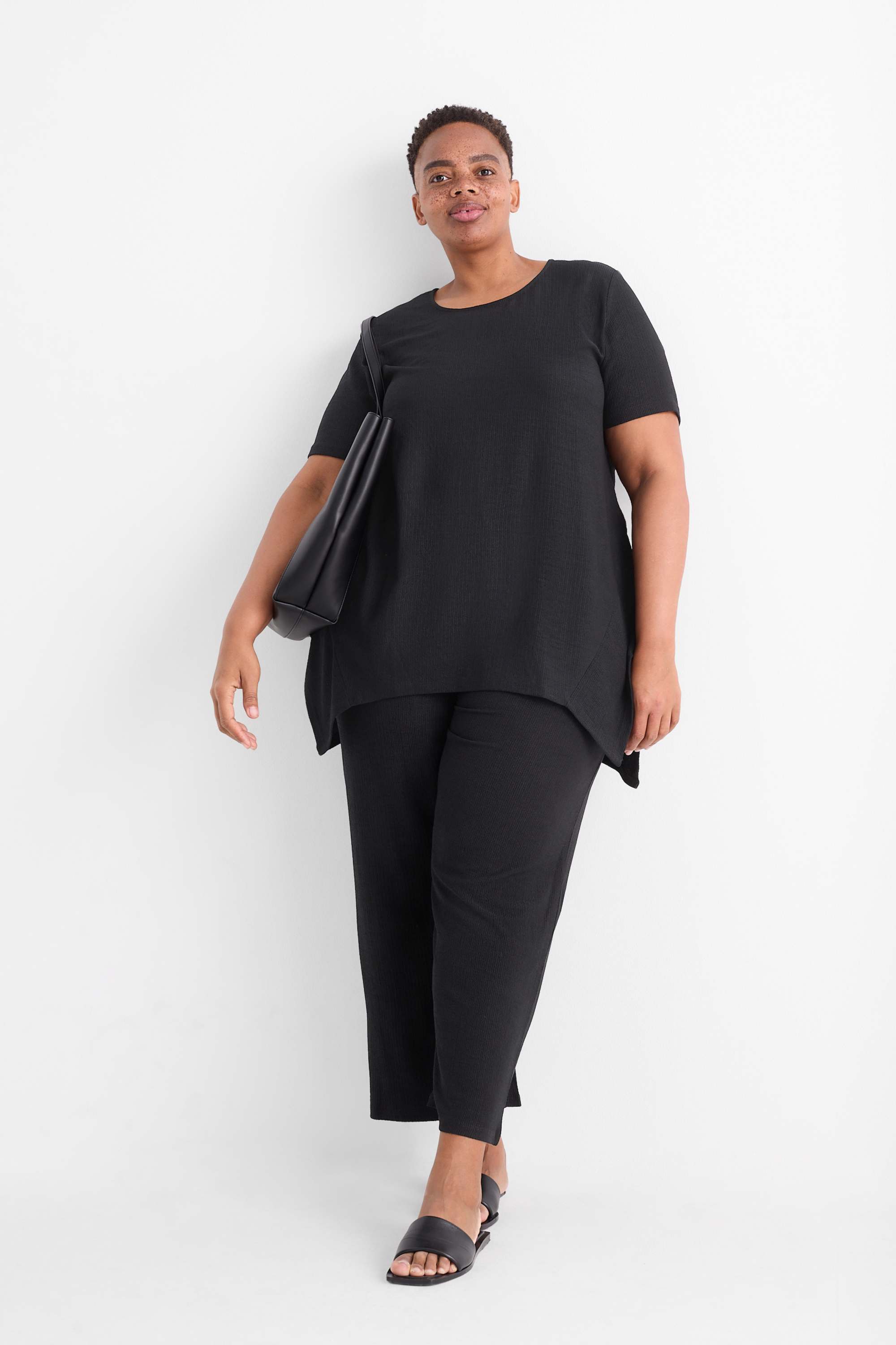 Jersey trousers - mid-rise waist - wide leg - textured black (1)