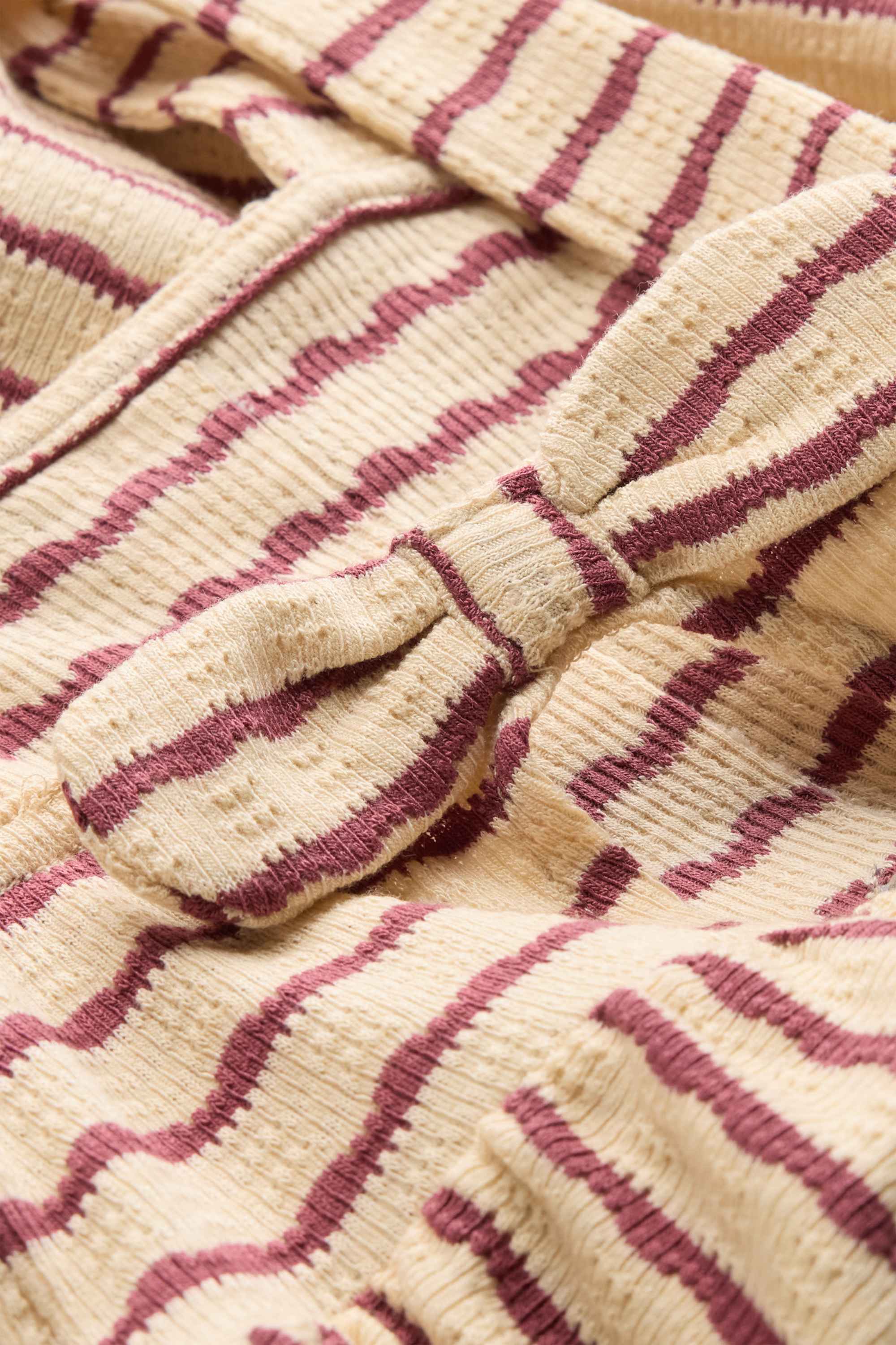 Knitted dress - striped beige / bordeaux