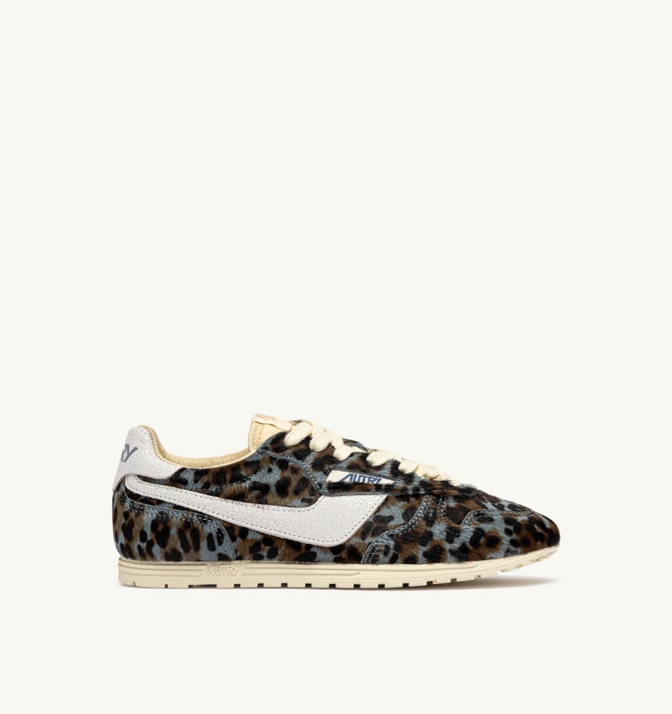 WINDSPIN IN GRAY LEOPARD AND WHITE PONY SKIN EFFECT MATERIAL