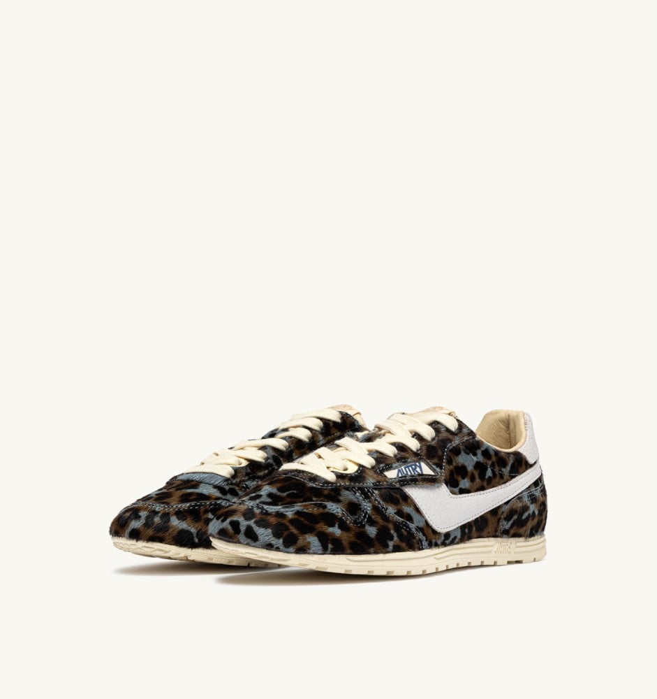 WINDSPIN IN GRAY LEOPARD AND WHITE PONY SKIN EFFECT MATERIAL