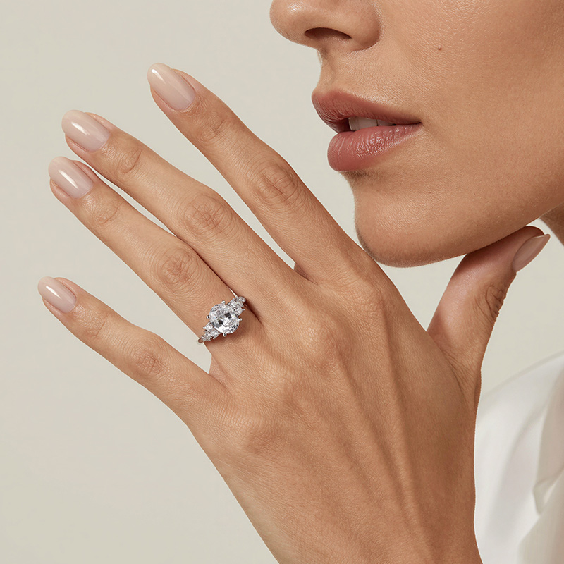 Jeulia Cluster Oval Cut Engagement Ring in Sterling Silver