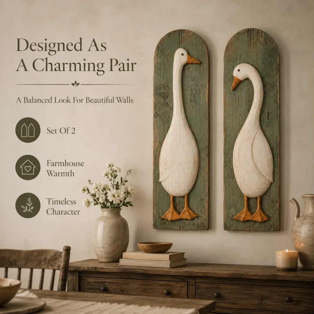 Two matching handcrafted goose wall panels arranged as a charming farmhouse pair