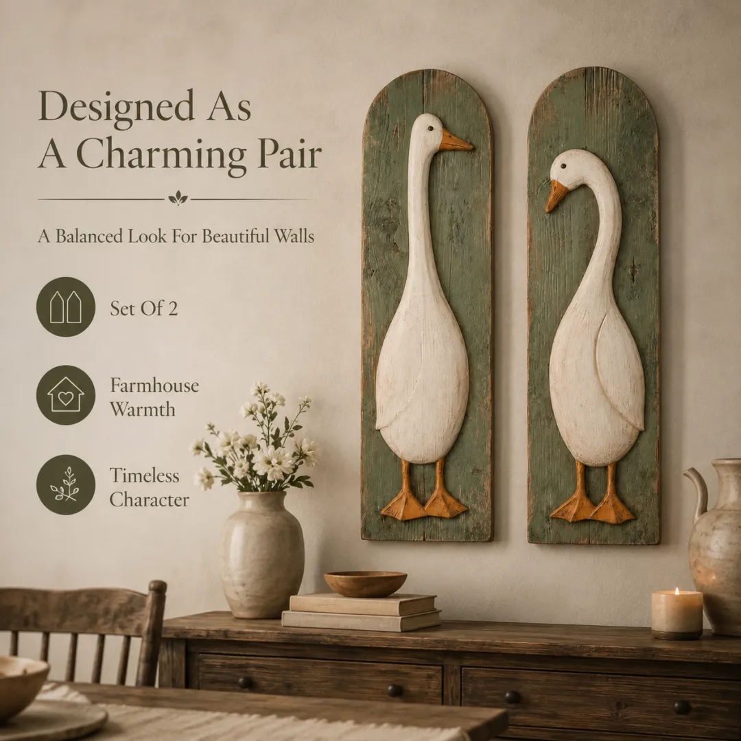 Two matching handcrafted goose wall panels arranged as a charming farmhouse pair