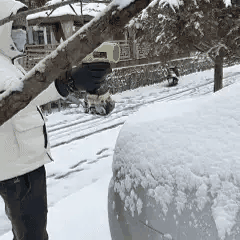 Blowing loose snow from a car