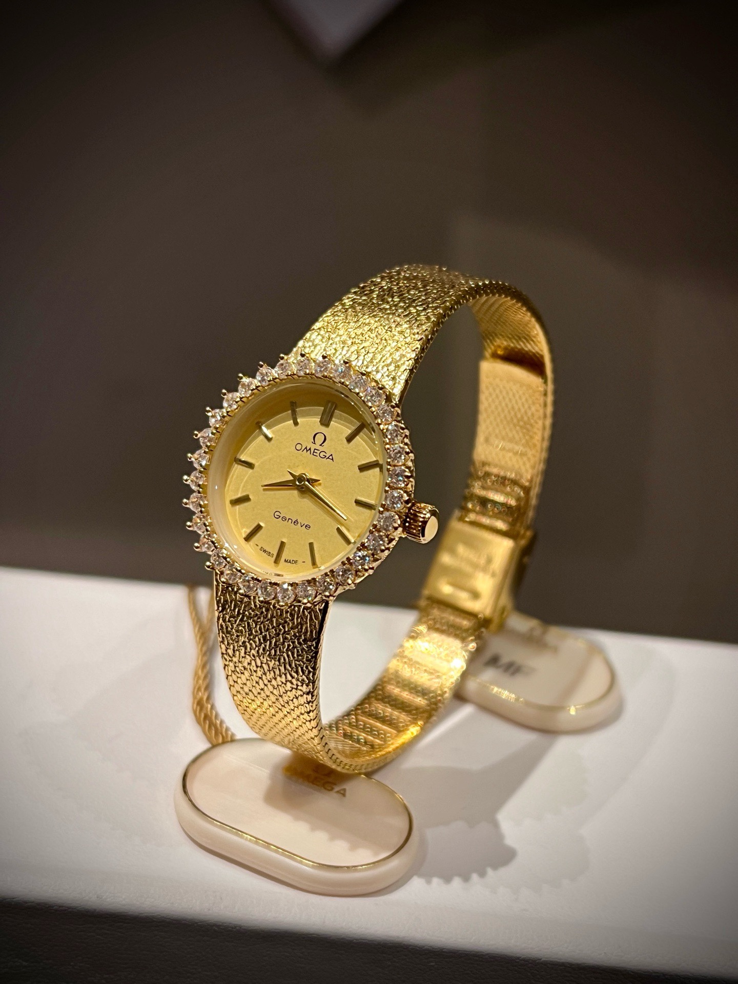 OMEGA Vintage Gold Tone Women Watch 26mm, Diamond Bezel Woven Band Jewelry Watch
