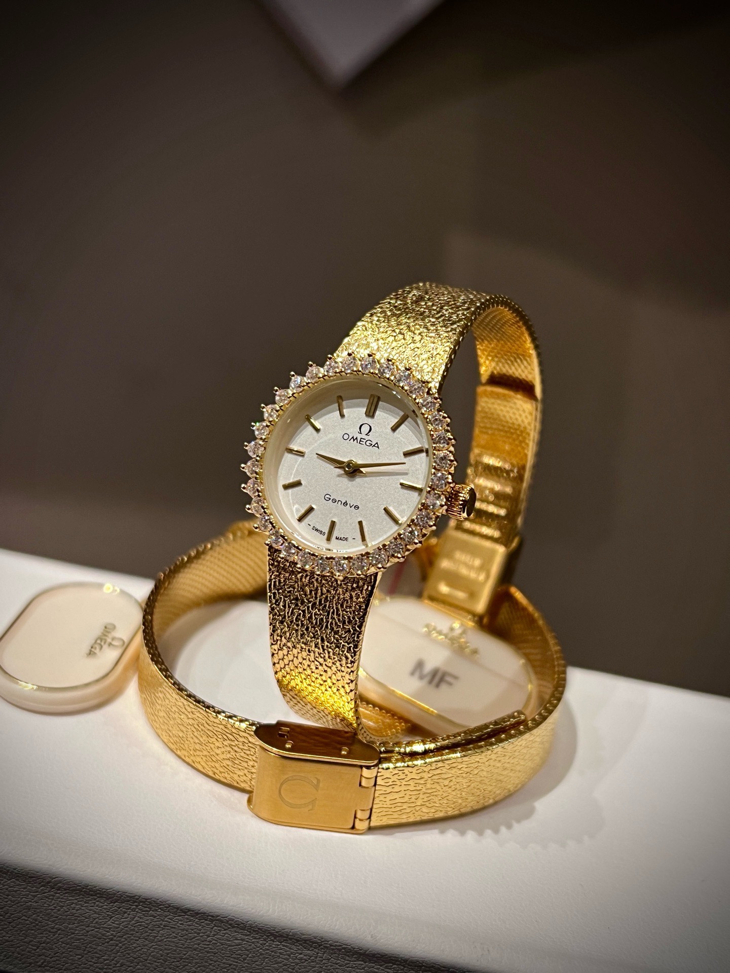 OMEGA Vintage Gold Tone Women Watch 26mm, Diamond Bezel Woven Band Jewelry Watch