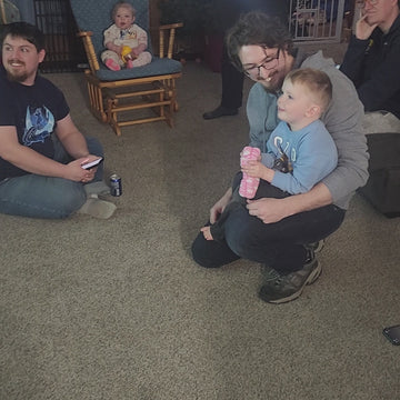 Ethan reacting with his family