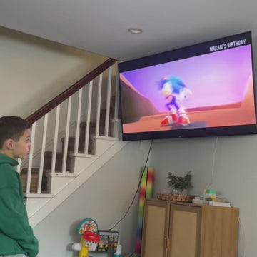 Makari watching his birthday video